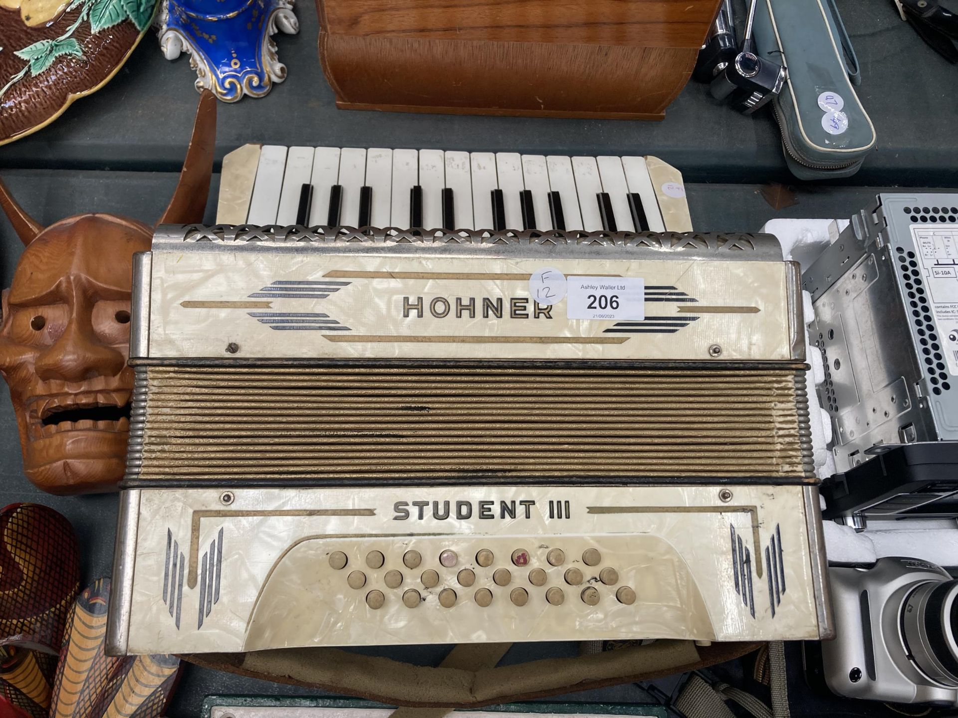 A HOHNER STUDENT III ACCORDIAN