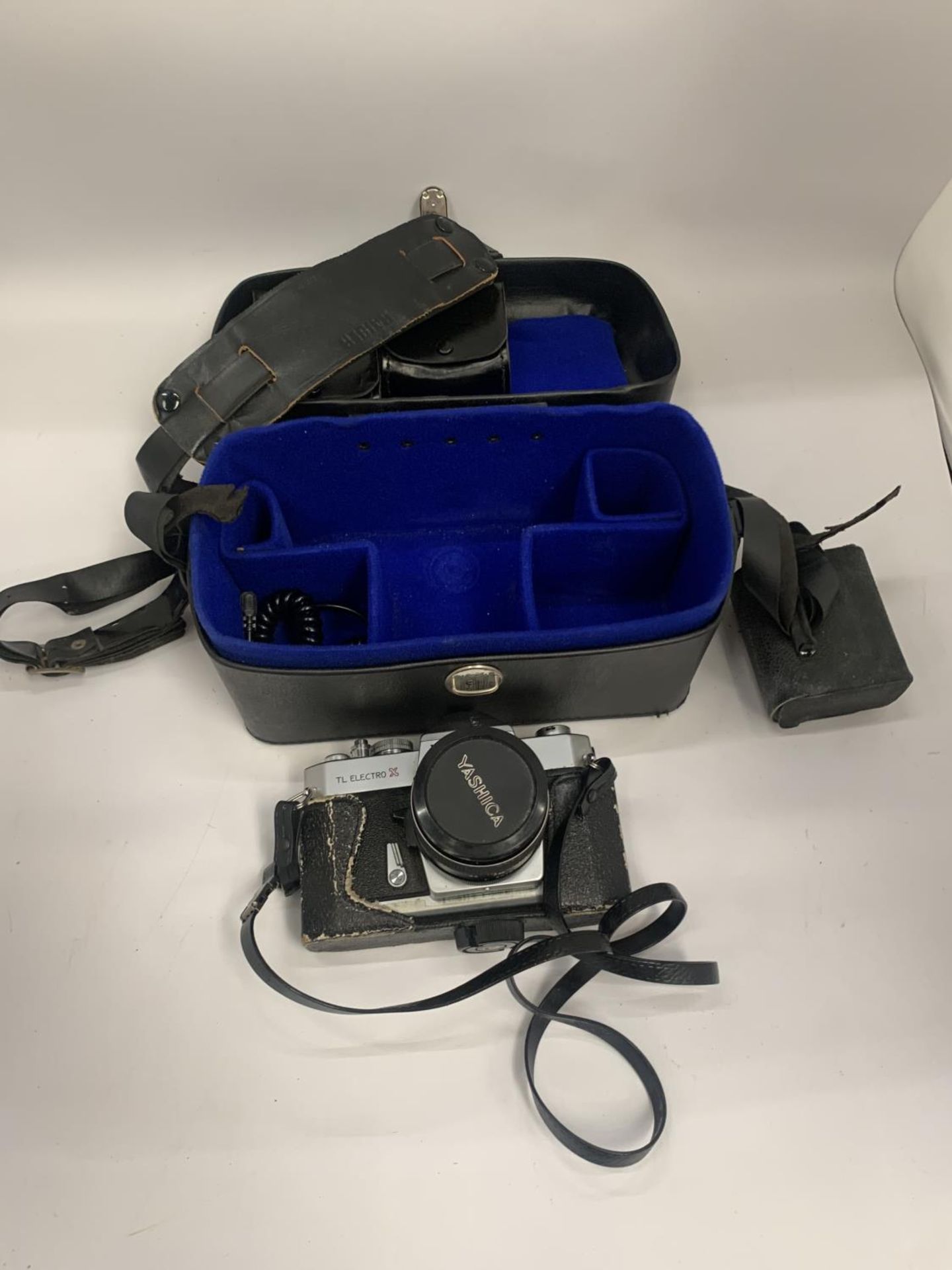 A YASHICA ELECTRO X CAMERA AND CASE