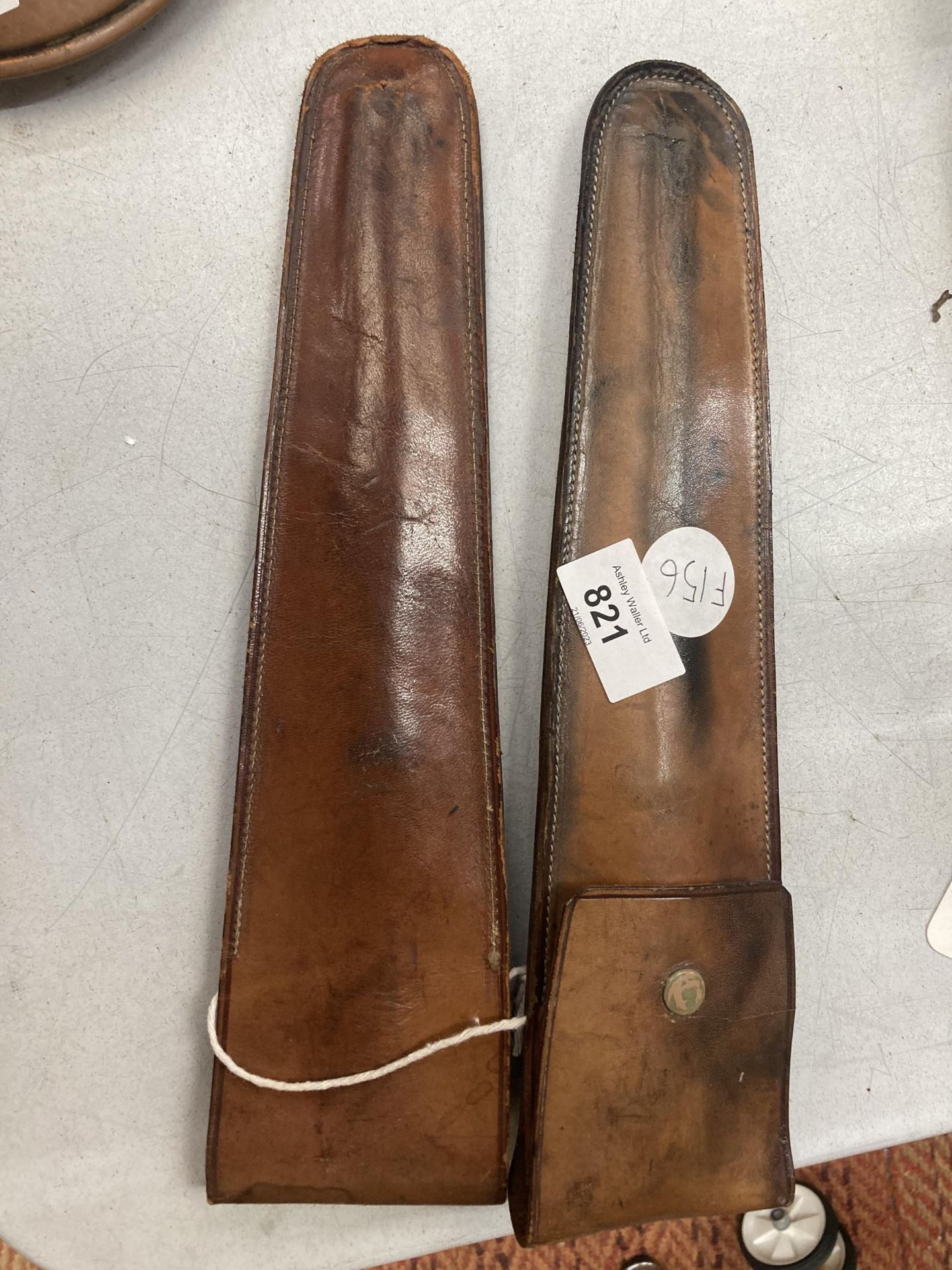TWO VINTAGE LEATHER HOLDERS