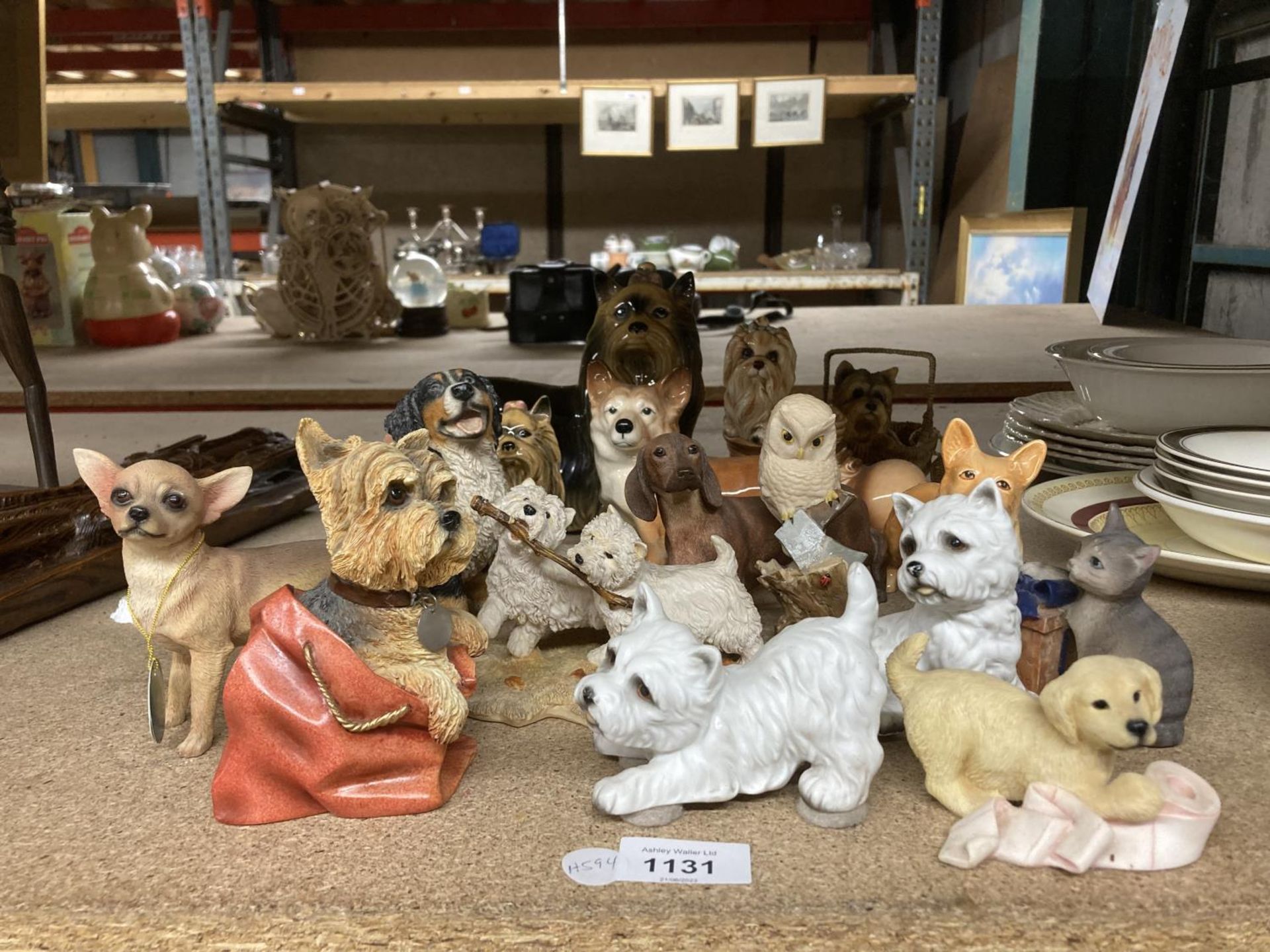 A COLLECTION OF DOG FIGURES