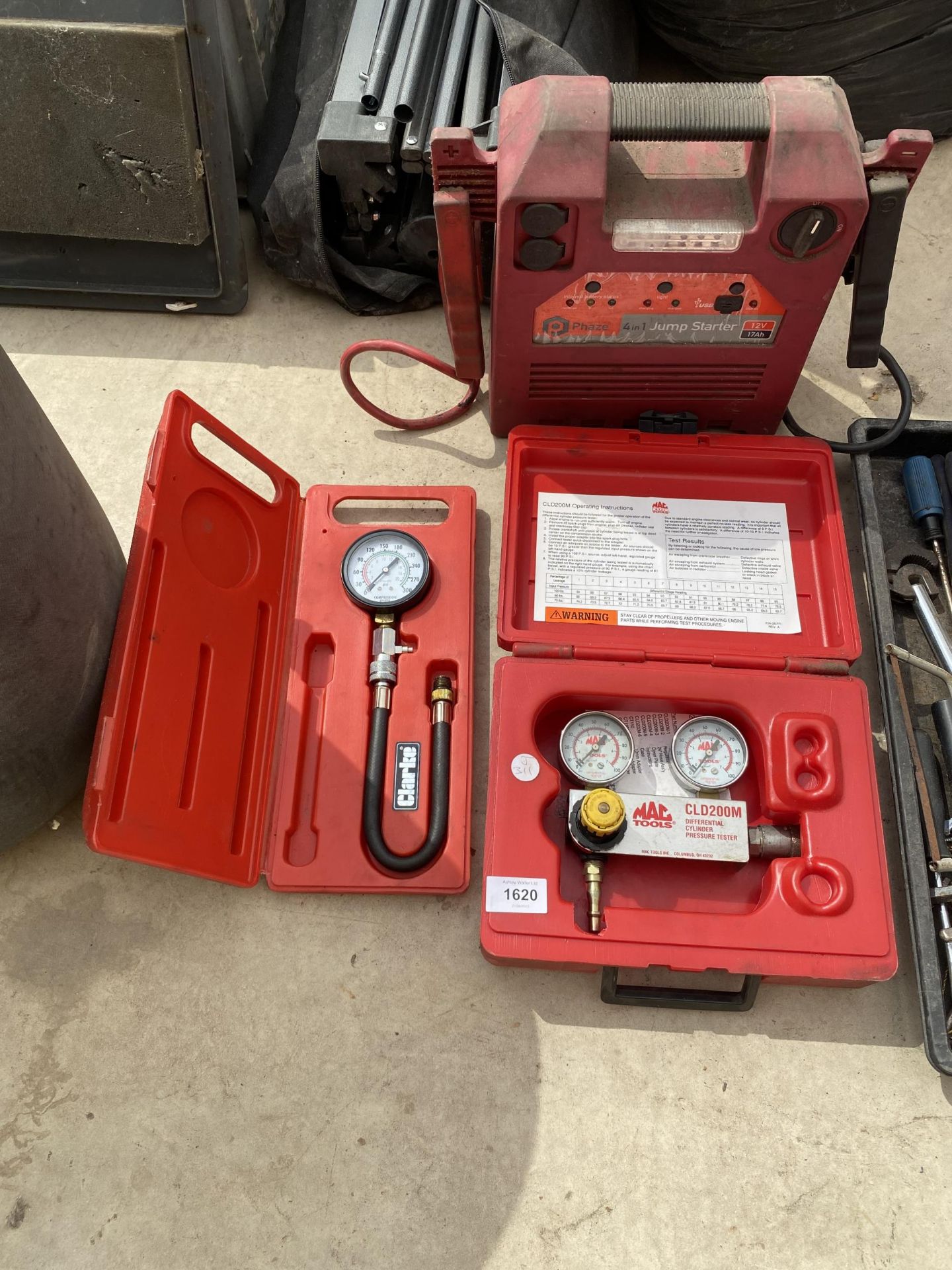 A BOXED MAC TOOLS DIFFERENTIAL CYLINDER PRESSURE TESTER, A BATTERY JUMP STARTER AND A CLARKE