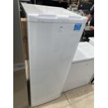 A WHITE BEKO UPRIGHT FFRIDGE BELIEVED IN WORKING ORDER BUT NO WARRANTY