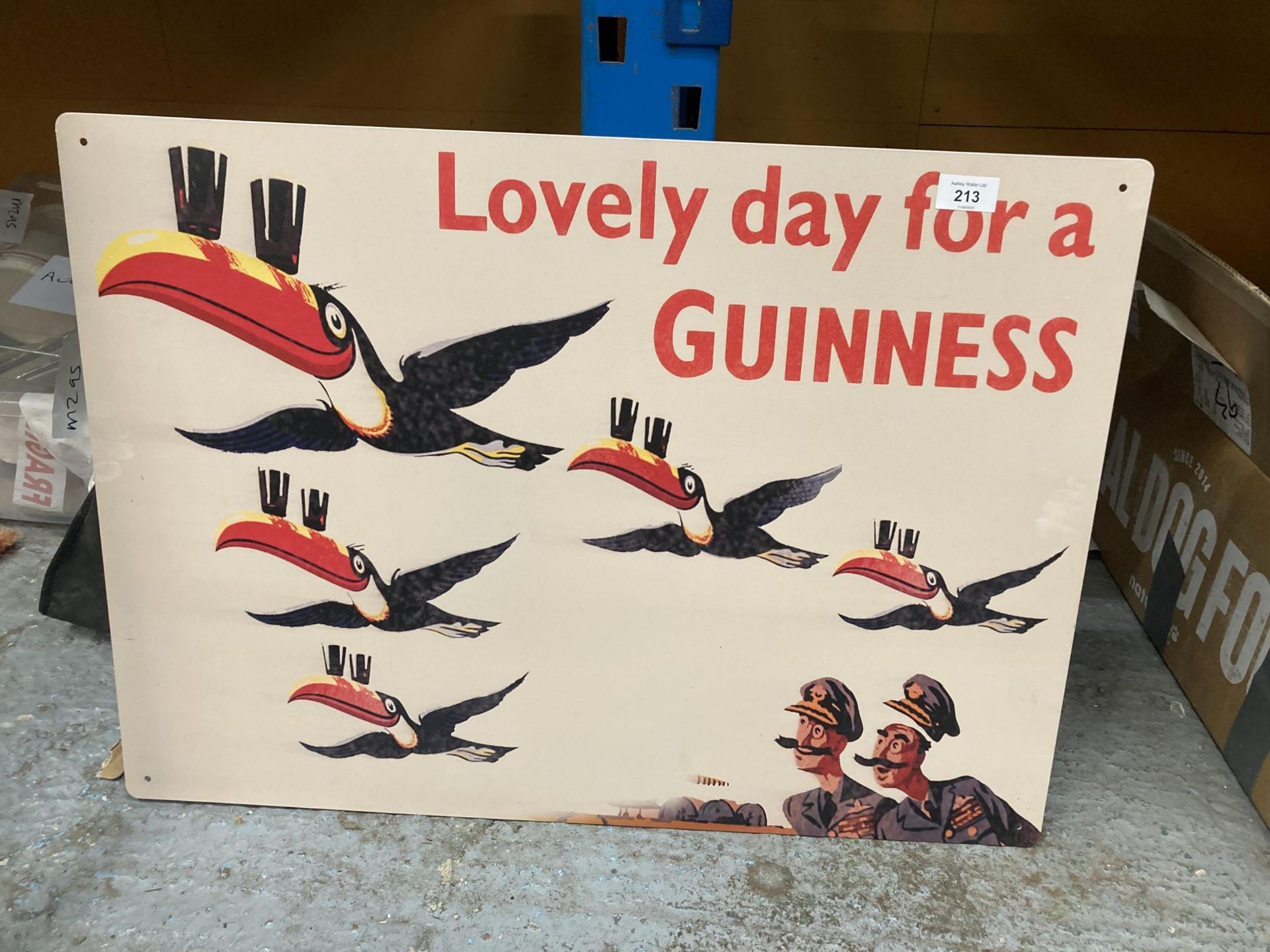 A TIN PLATE SIGN 'LOVELY DAY FOR A GUINNESS' 70CM X 50CM