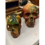 TWO RESIN SKULLS HEIGHTS 10CM AND 12CM