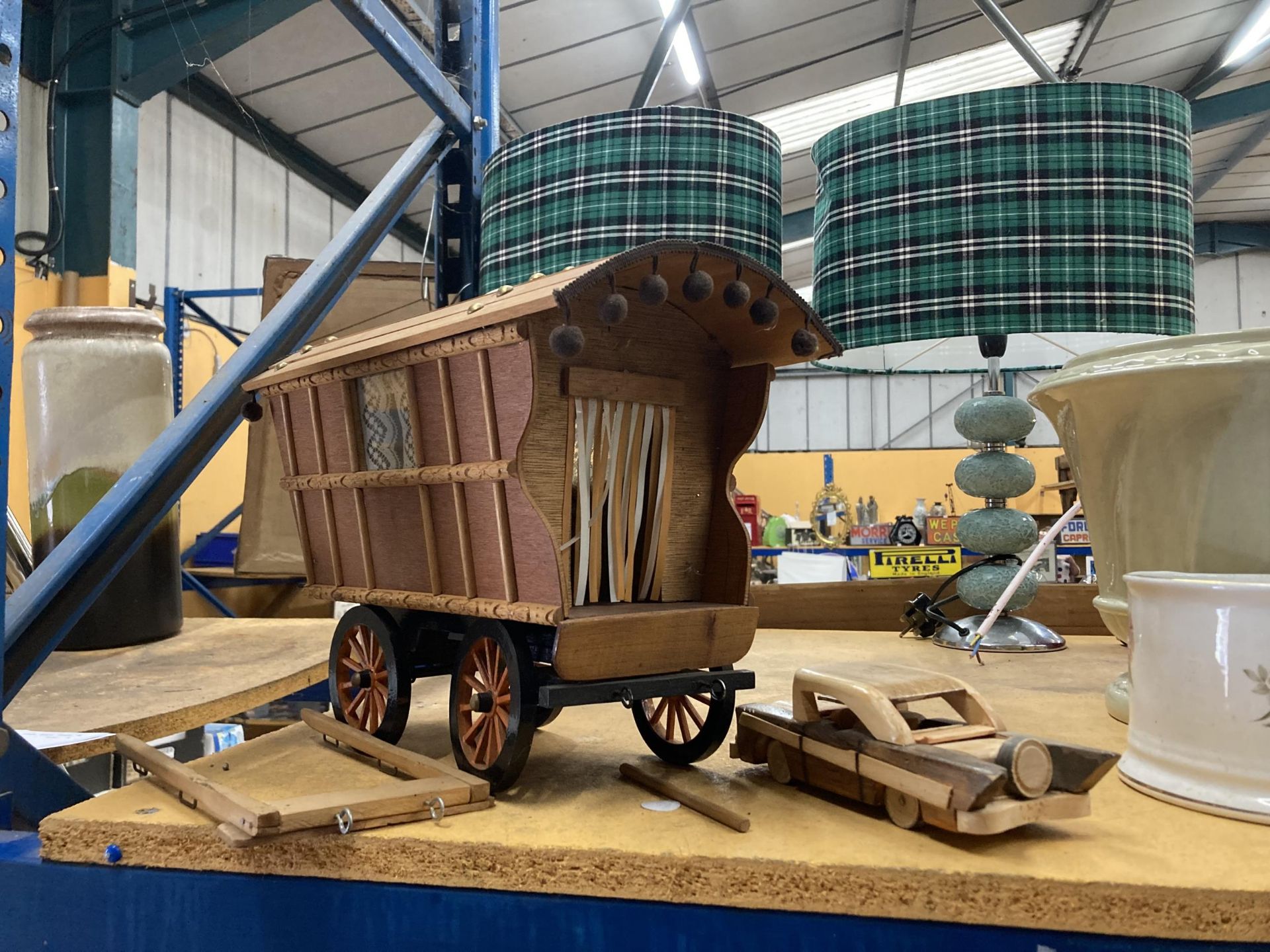 A WOODEN ROMANY CARAVAN AND CAR