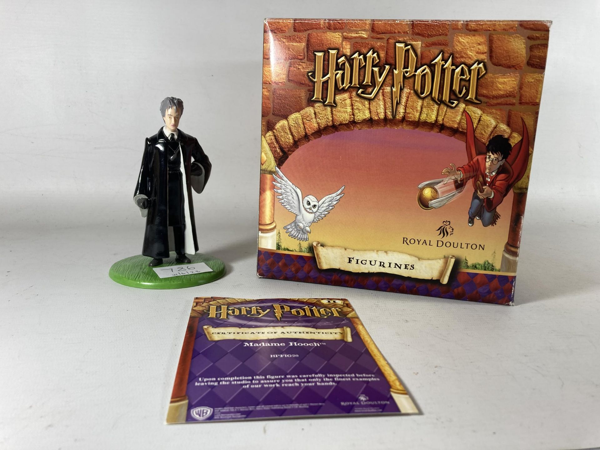 A ROYAL DOULTON HARRY POTTER FIGURE 'MADAME HOOCH' - BOXED WITH CERTIFICATE OF AUTHENTICITY