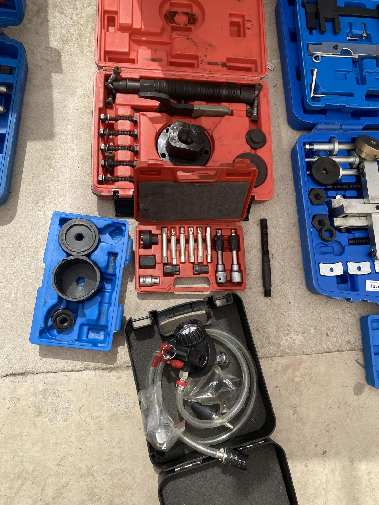 AN ASSORTMENT OF MECHANICS TOOLS TO INCLUDE AN ALTERNATOR BIT SET AND A COOLING SYSTEM FILLER ETC