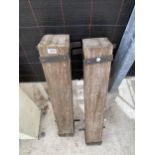 A PAIR OF WOODEN BOLT ON POSTS