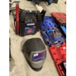 A SEALEY BATTERY JUMP STARTER AND A WELDING MASK