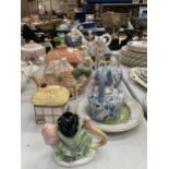 A COLLECTION OF NOVELTY CERAMIC TEAPOTS TO INCLUDE FROG AND PONY EXAMPLES