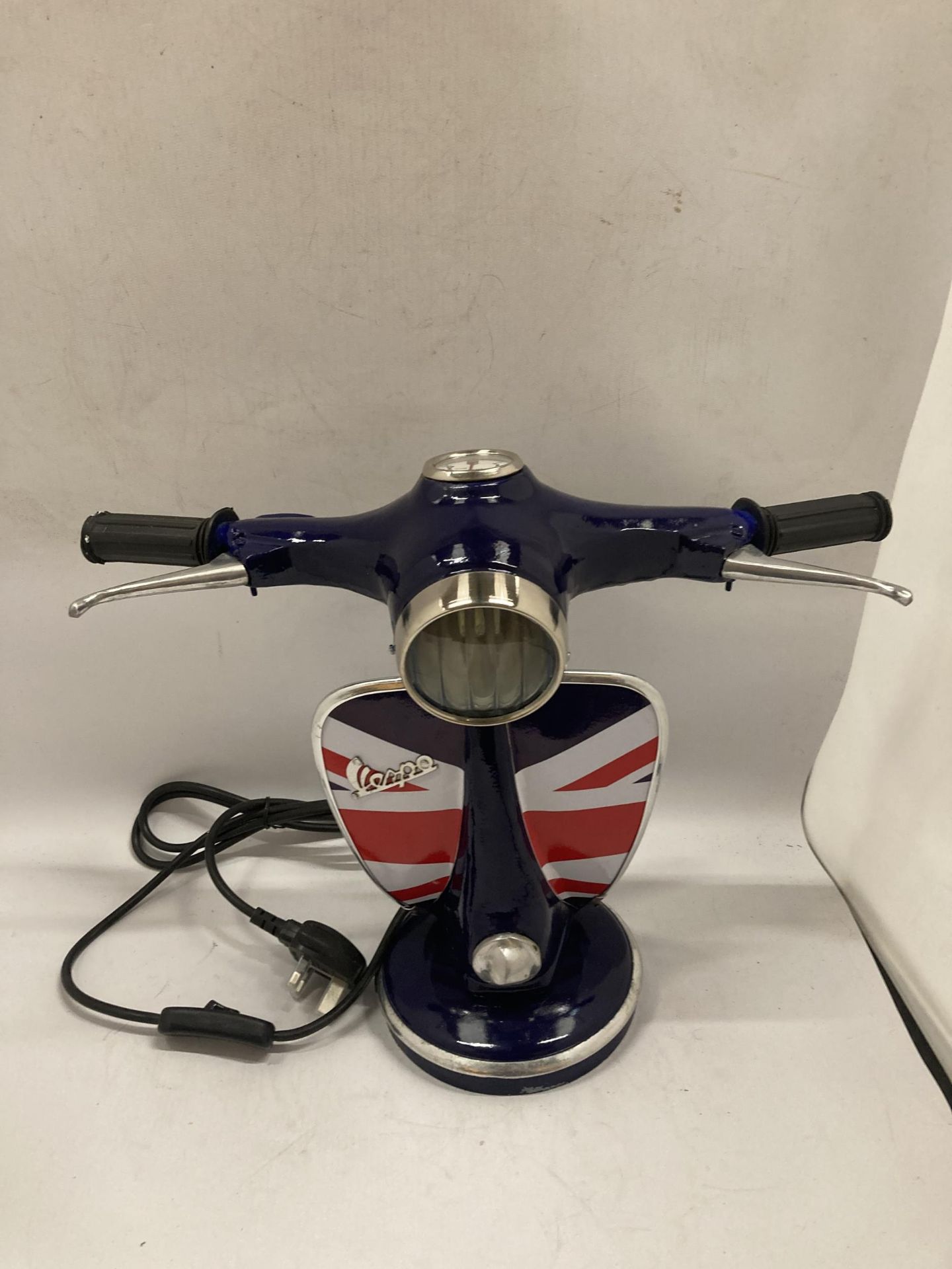 A BLUE VESPA STYLE DESK LAMP