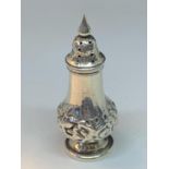 A HALLMARKED SILVER PEPPER POT