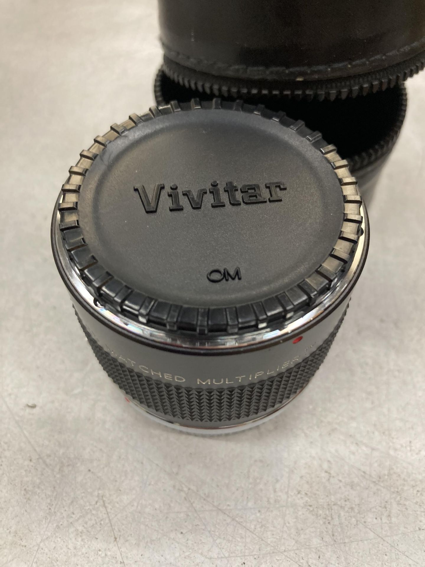 A VIVITAR M.C. 75-205MM 2X MATCHED MULTIPLIER CAMERA LENS