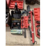 AN ASSORTMENT OF TOOLS TO INCLUDE A POT RIVOTER, AN AXEL STAND AND A COMPRESSOR ATTATCHMENT ETC