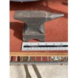 A MINIATURE CAST IRON SAMPLE ANVIL WITH STAND