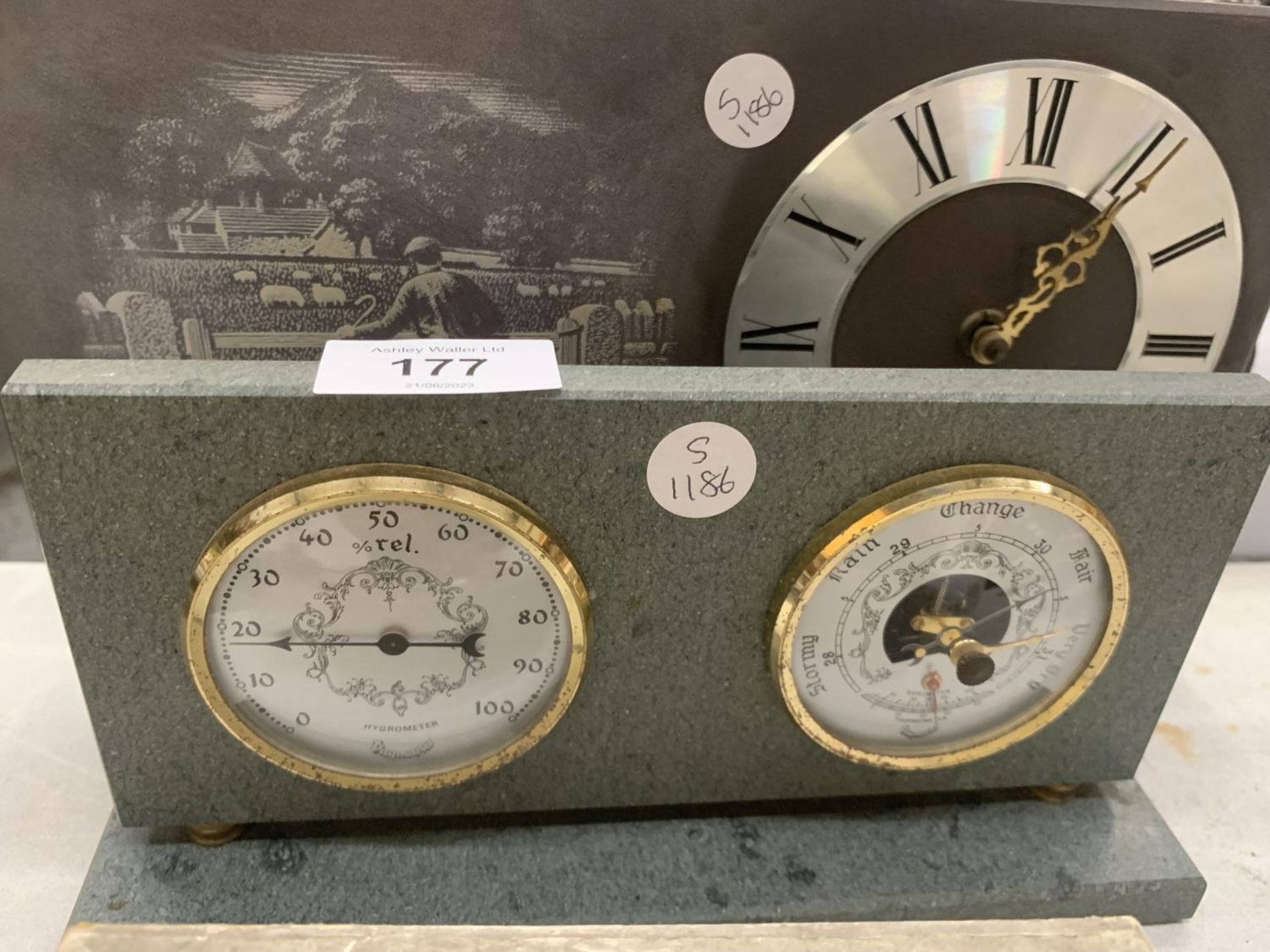 A SLATE MANTLE CLOCK WITH A SHEPHERD AND SHEEPDOG IMAGE AND A SLATE BAROMETER AND HYGROMETER - Image 2 of 3