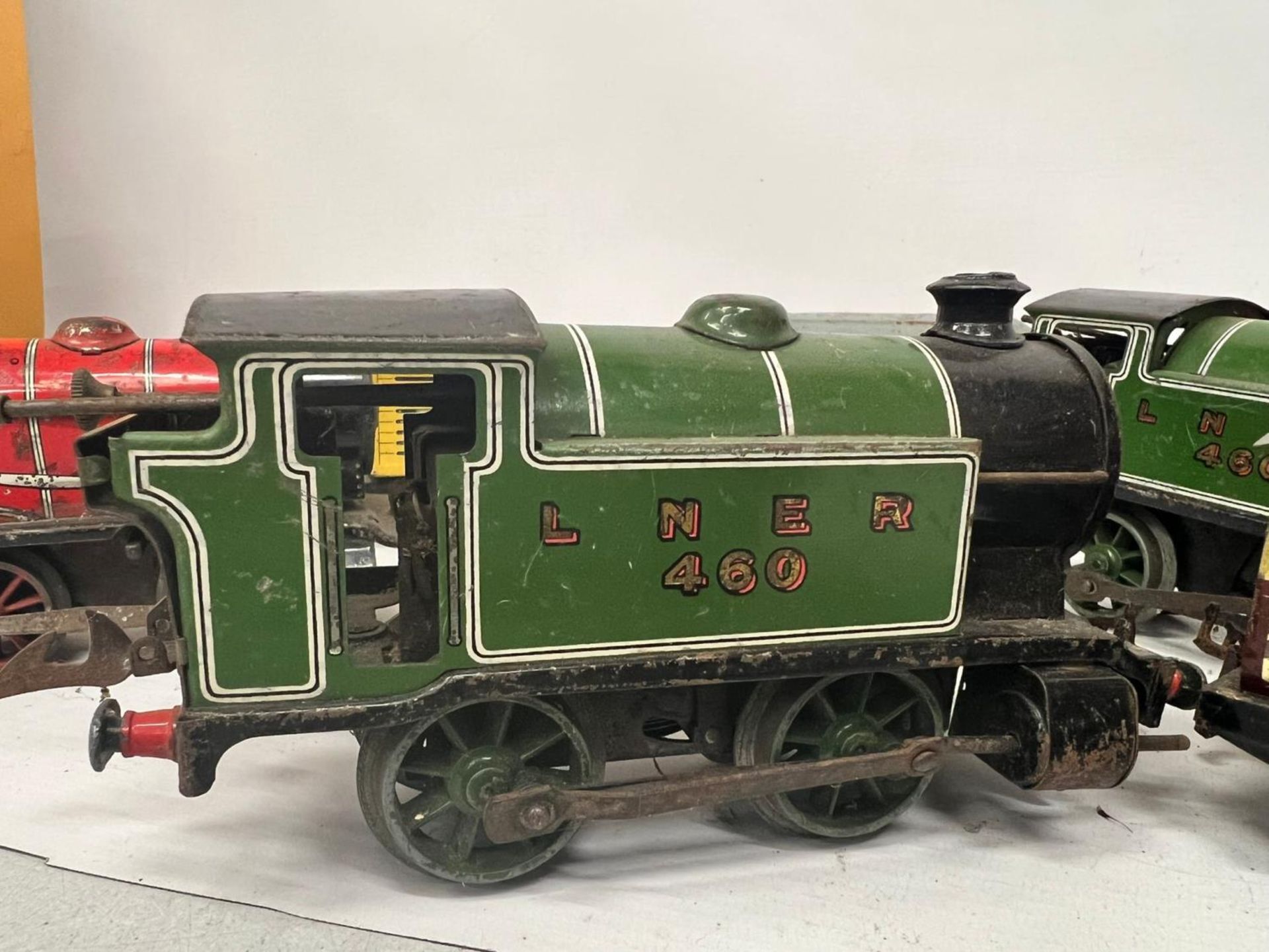 EIGHT O GAUGE MODEL RAILWAY ROLLING STOCK - FOUR CLOCKWORK LOCOMOTIVES, TWO PULLMAN CARRIAGES AND - Image 4 of 5