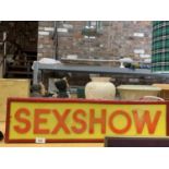 A 'SEXSHOW' ILLUMINATED BOX SIGN, 19 X 71CM