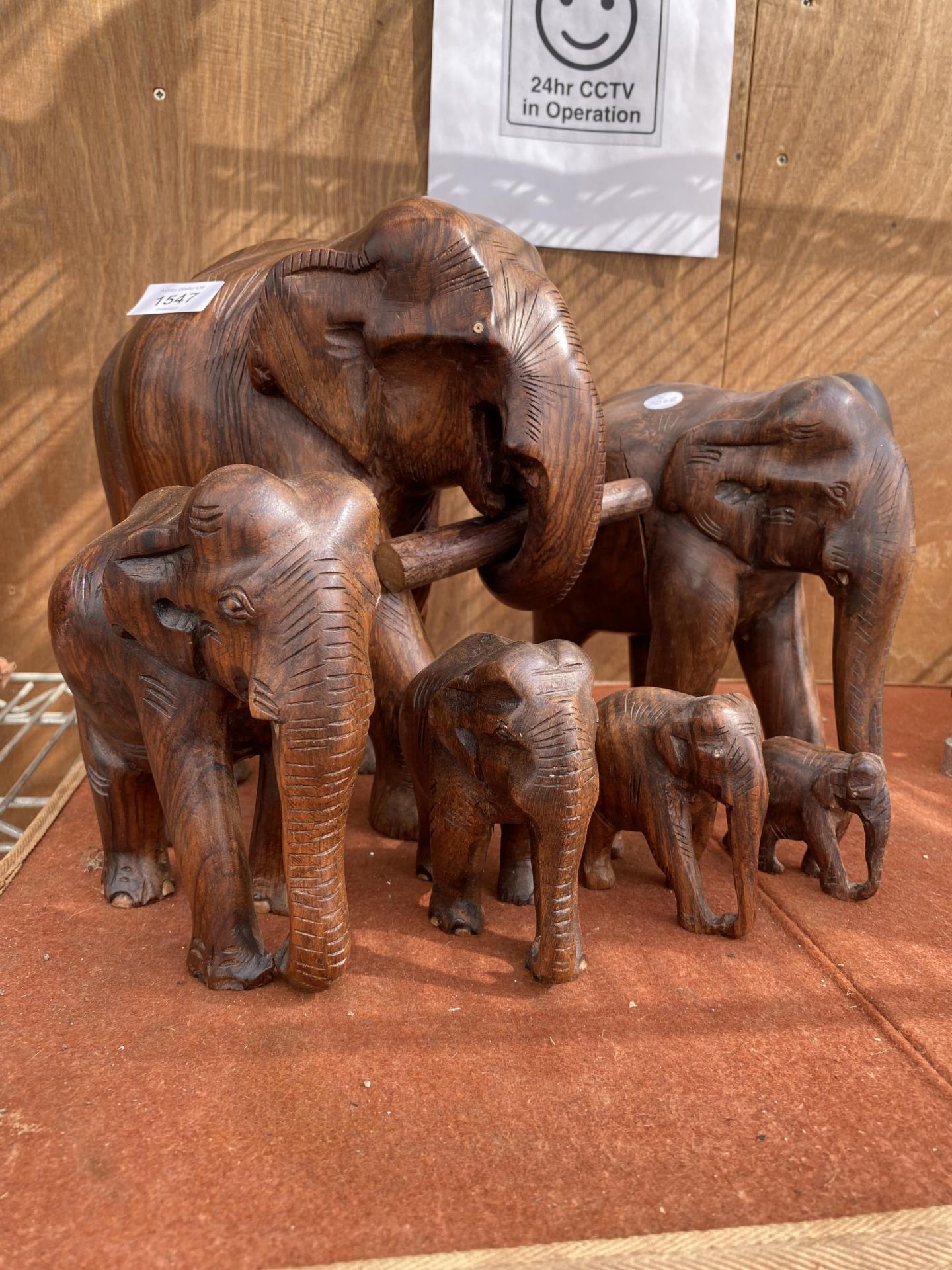 A COLLECTION OF SIX TREEN ELEPHANTS OF VARIOUS SIZES - Image 2 of 3