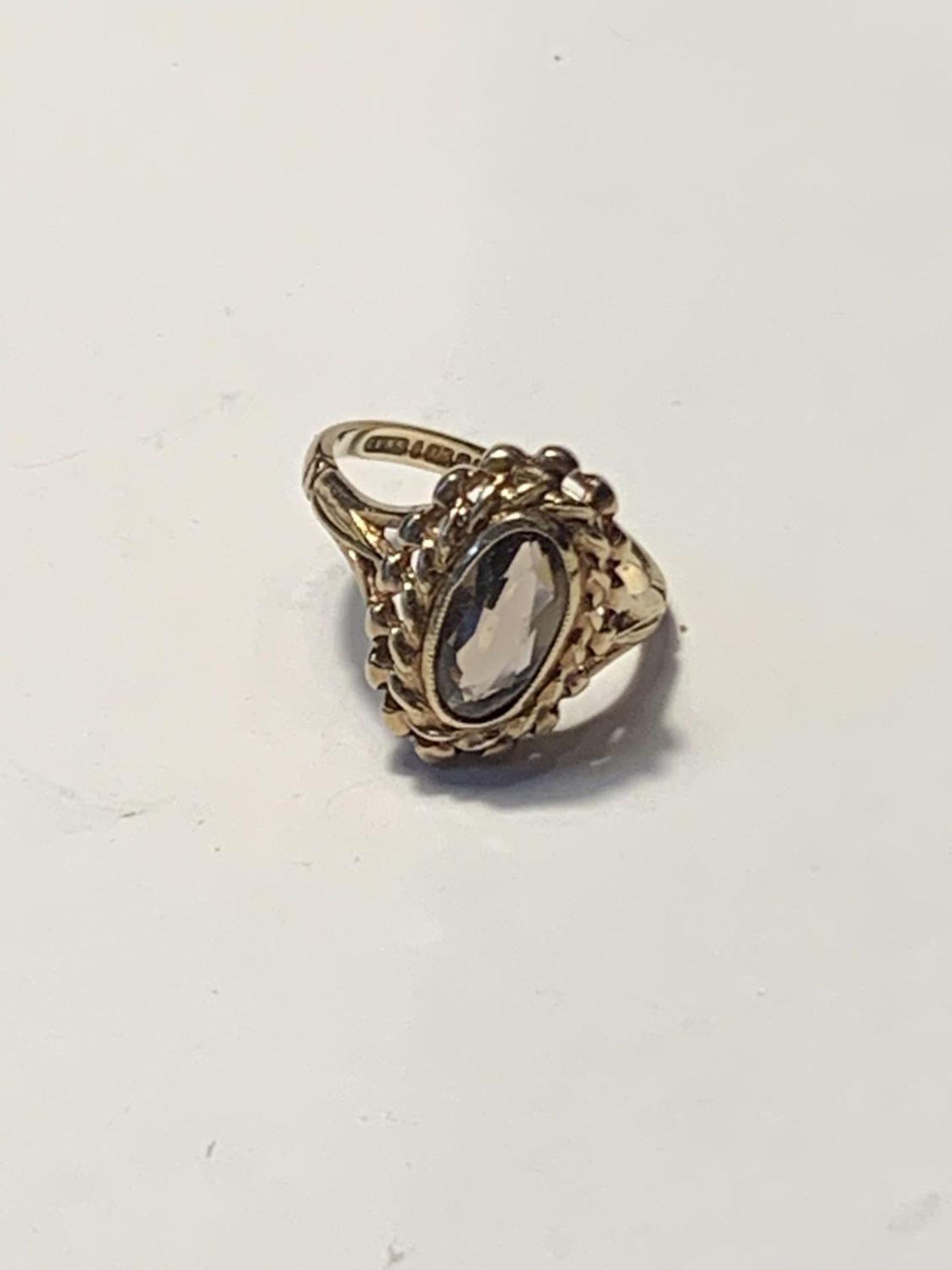 A 9 CARAT GOLD RING WITH AN OVAL SOLITAIRE STONE SIZE K GROSS WEIGHT 2.58 GRAMS - Image 2 of 3