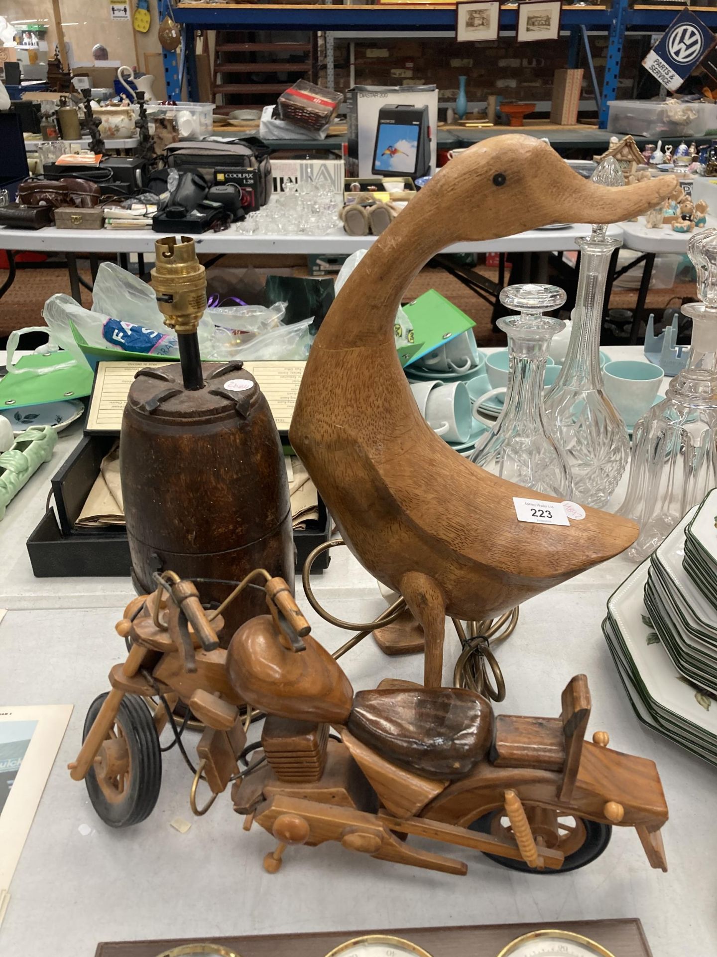 A MIXED LOT TO INCLUDE WOODEN DUCK, WOODEN MOTORBIKE MODEL, SHIPS BAROMETER ETC