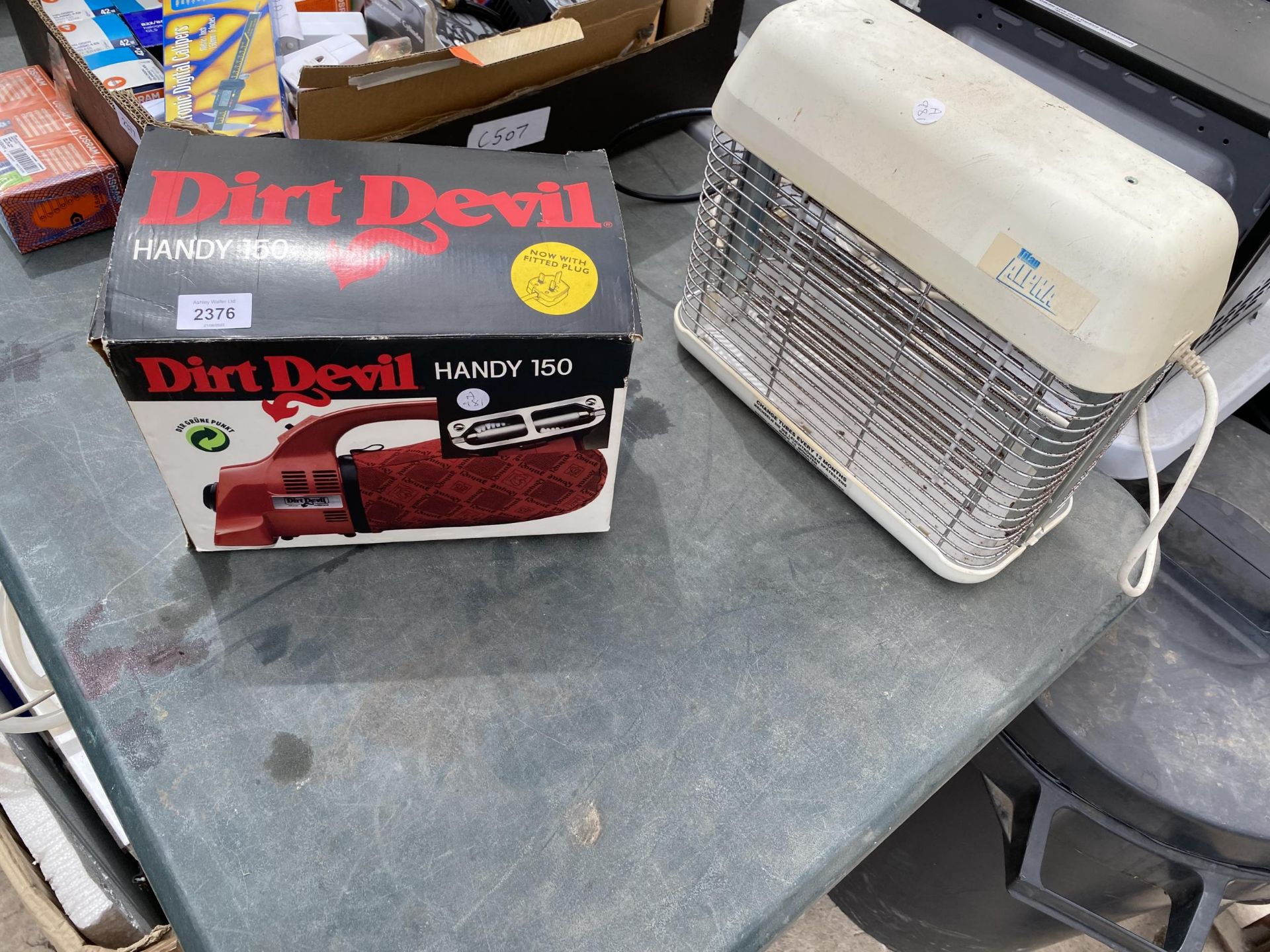 A DIRT DEVIL HANDY VAC AND AN INSECT LIGHT