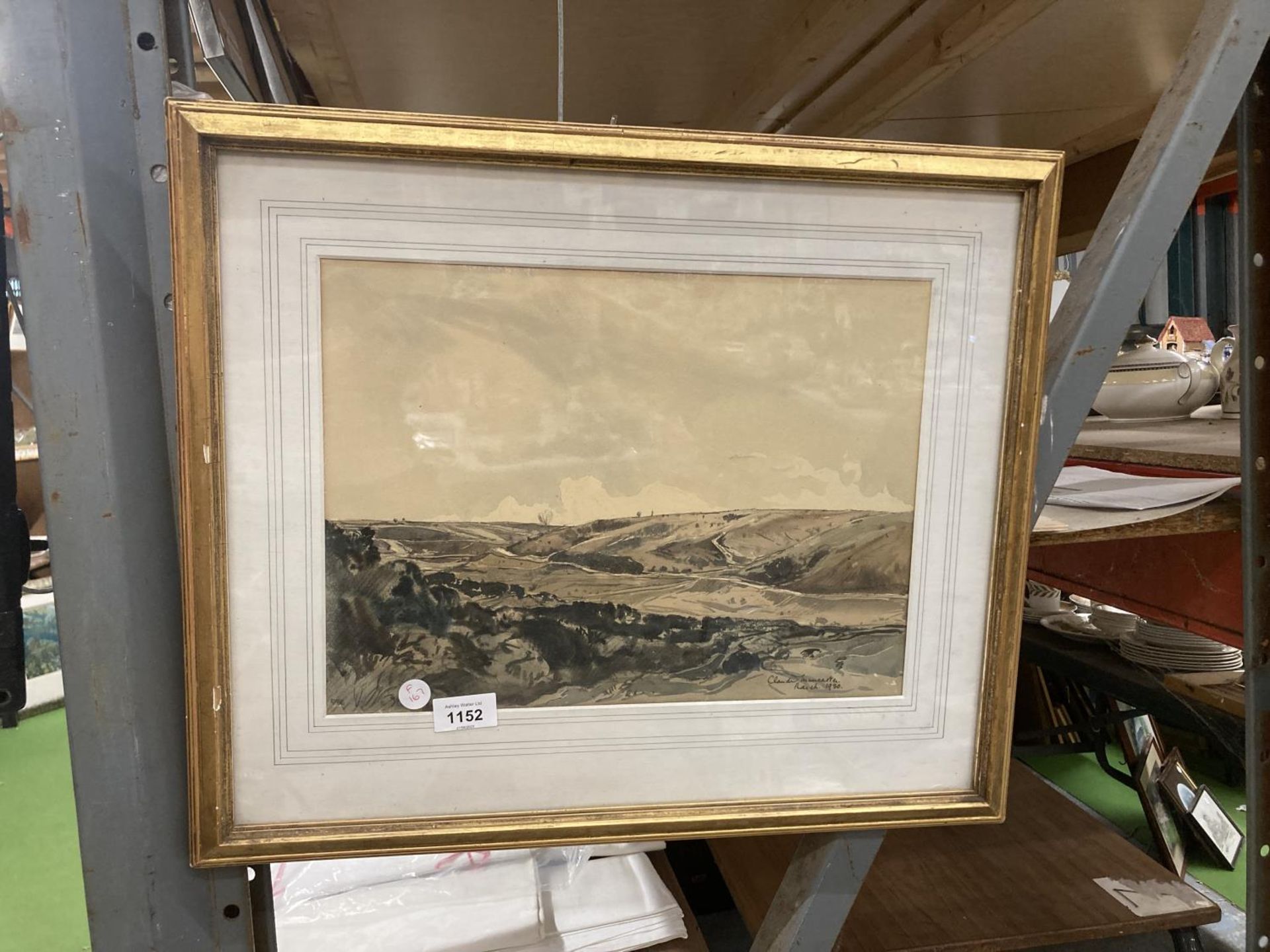 A GILT FRAMED WATERCOLOUR OF A HILL LANDSCAPE, INDISTINCTLY SIGNED, DATED 1930