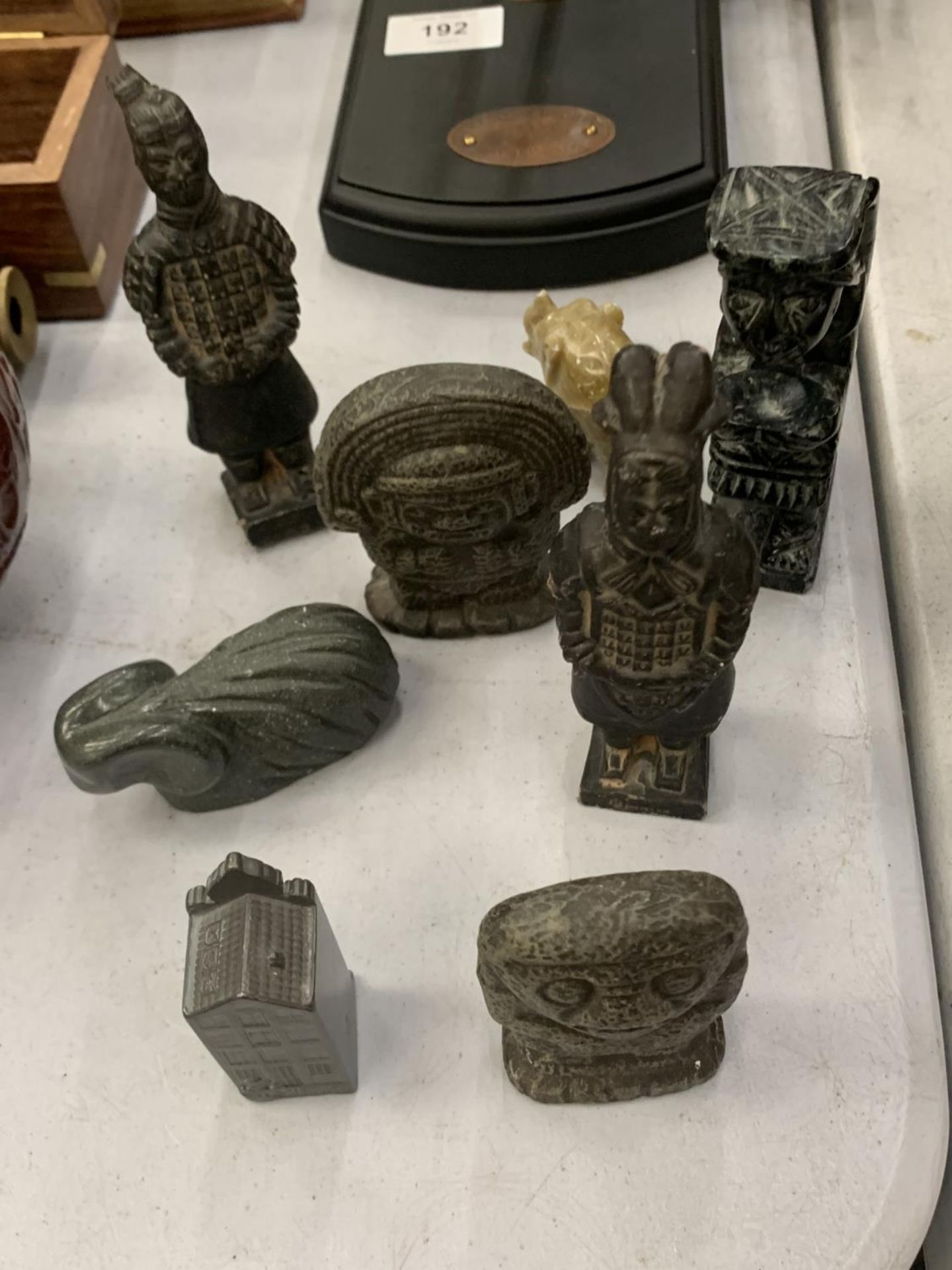 A QUANTITY OF CARVED STONE FIGURES TO INCLUDE A RAM, ORIENTAL STYLE, AZTEC STYLE, ETC