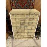 A 42 DRAWER METAL PIGEON HOLE STORAGE UNIT