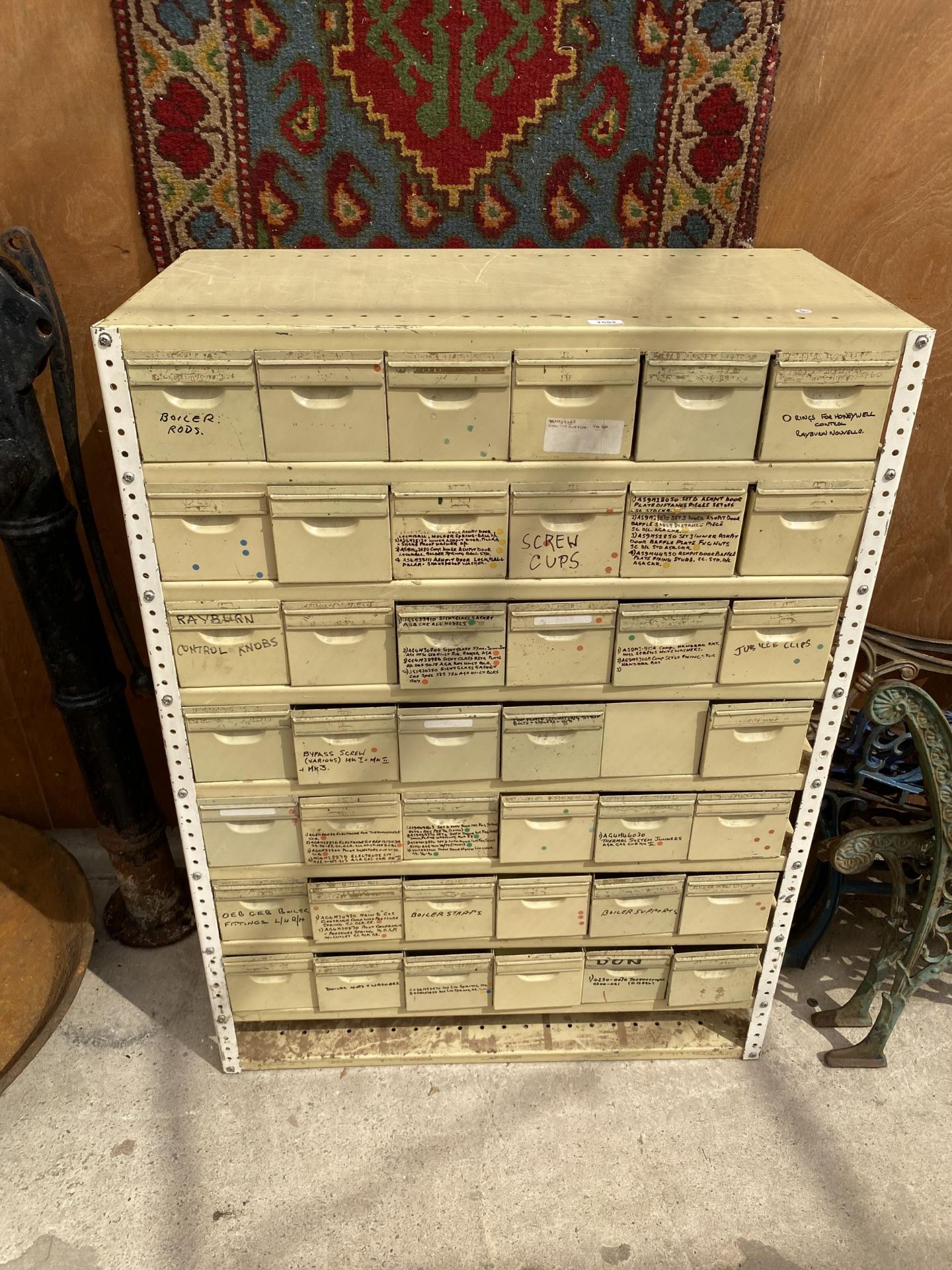 A 42 DRAWER METAL PIGEON HOLE STORAGE UNIT