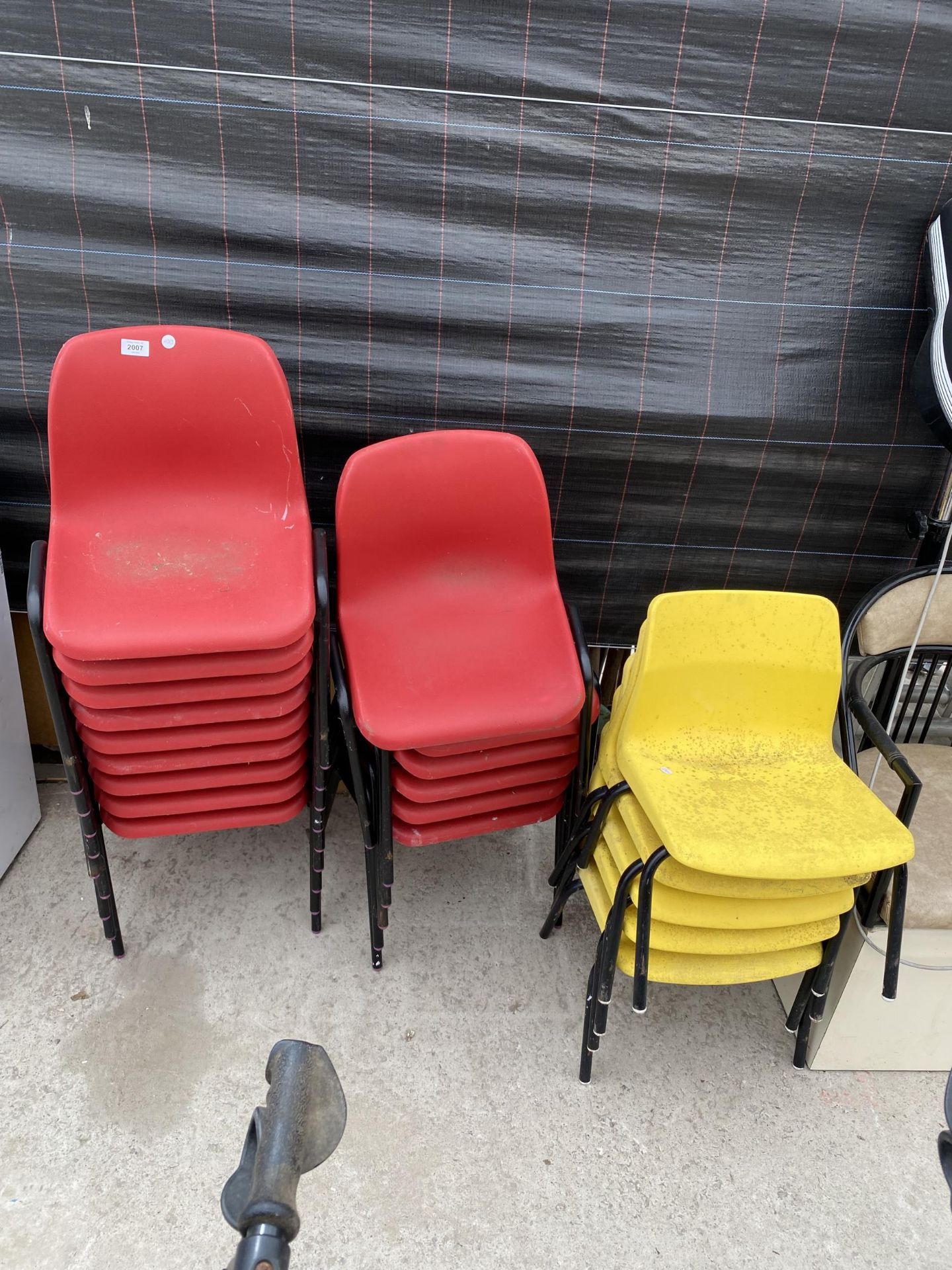 A LARGE QUANTITY OF CHILDRENS STACKING CHAIRS