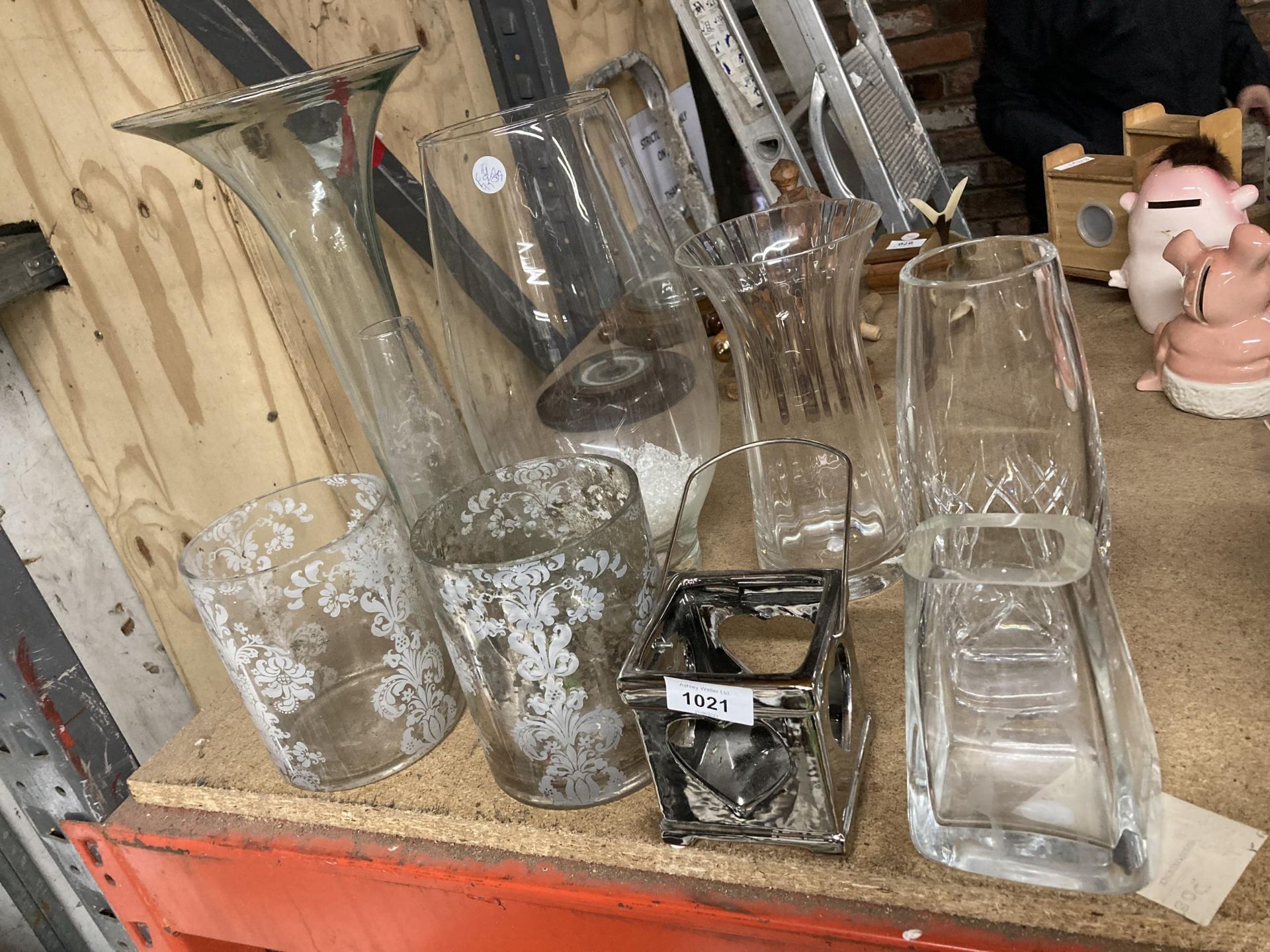 A QUANTITY OF GLASSWARE VASES AND CANDLE HOLDERS