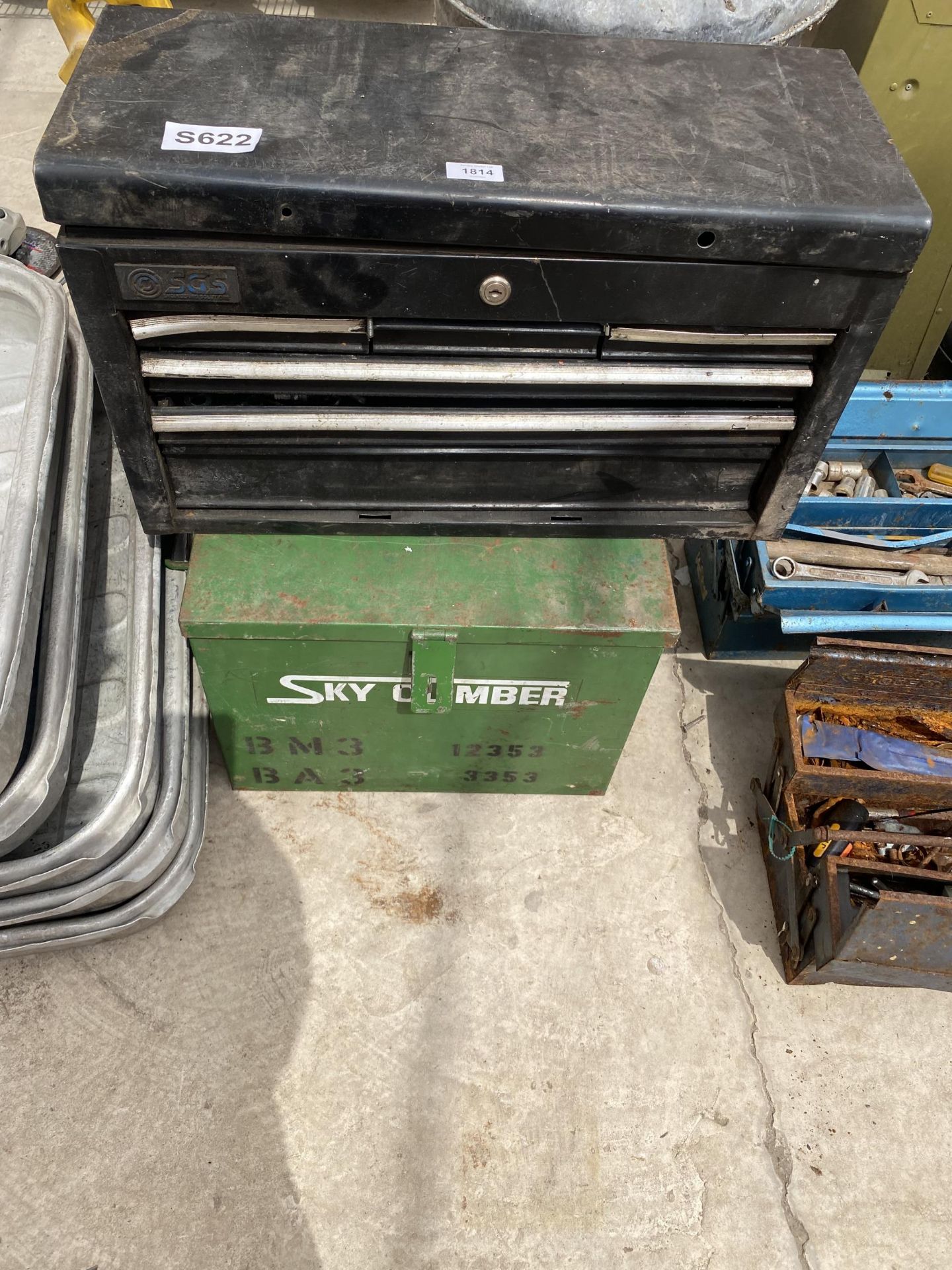 A METAL TOOL CHEST AND A FURTHER METAL STORAGE BOX