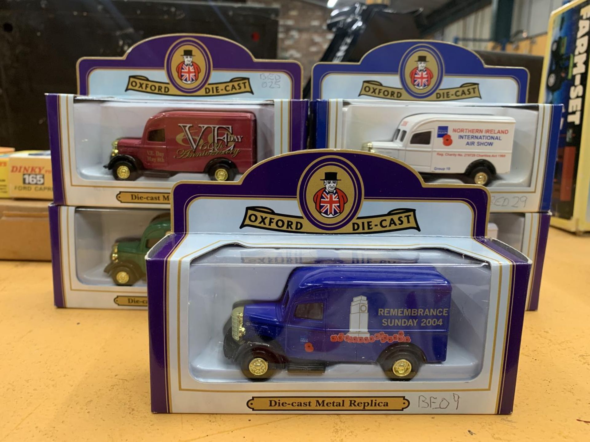 FIVE OXFORD DIECAST BOXED BEDFORD VANS ANNIVERSARY MODELS