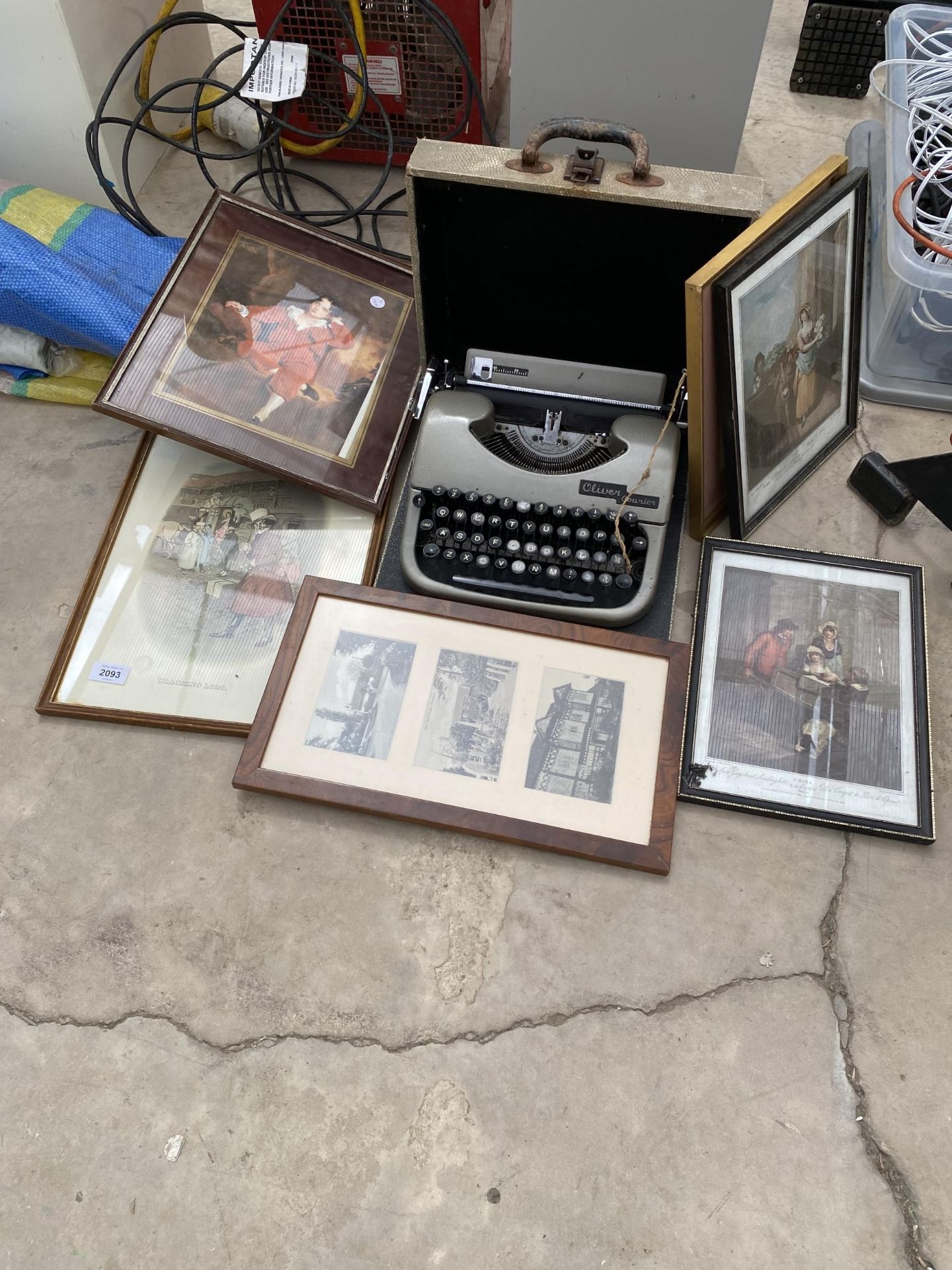 AN OLIVER TYPEWRITER AND SIX FRAMED PRINTS