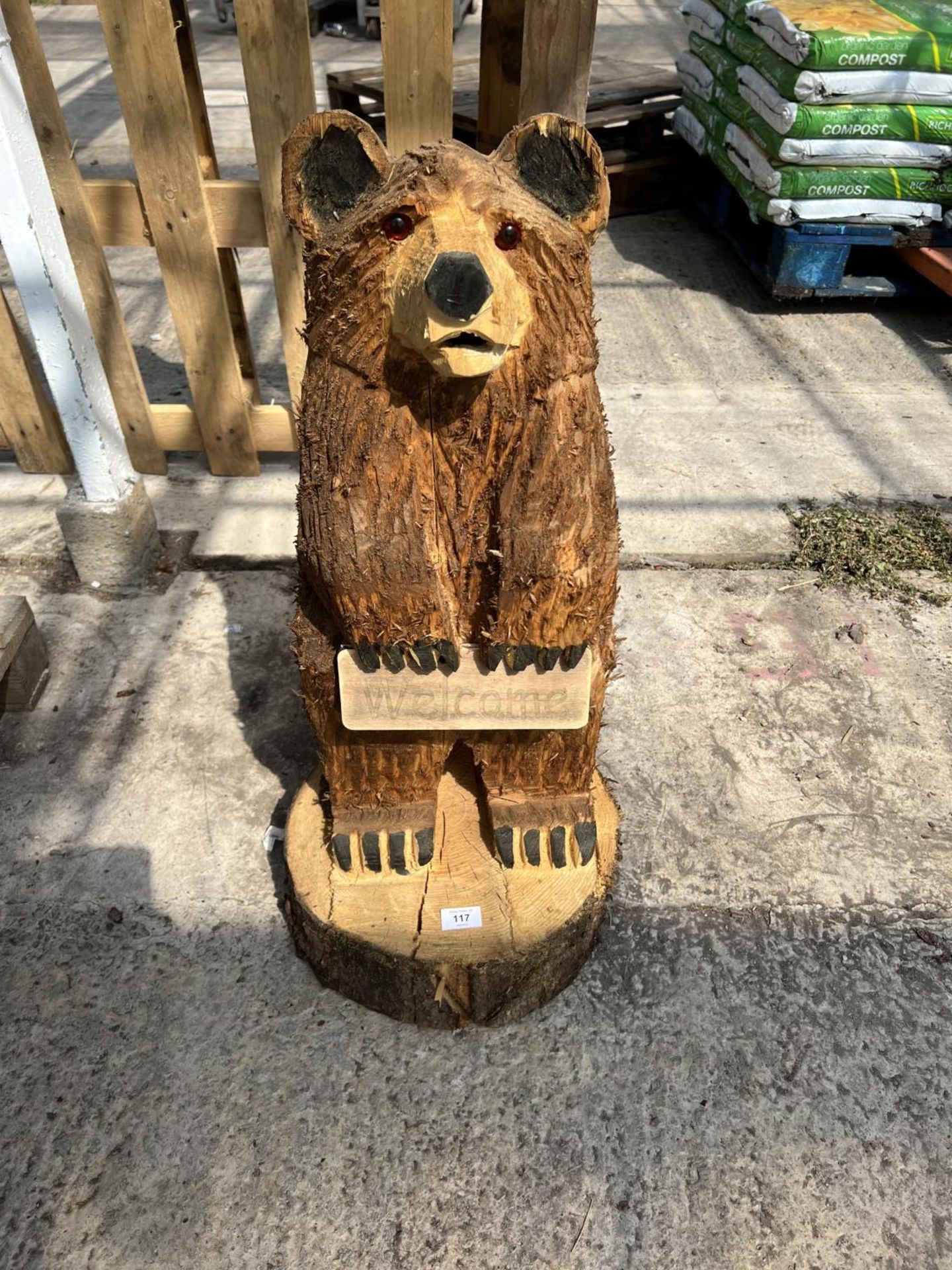 A WELCOME BEAR WOOD CARVING APPROXIMATELY 80 CM TALL NO VAT