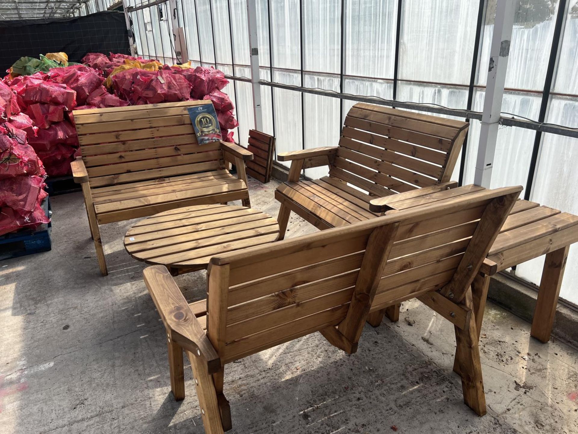 AN AS NEW EX DISPLAY CHARLES TAYLOR PATIO SET COMPRISING THREE 2 SEAT BENCHES TWO TABLES ONE ROUND & - Bild 2 aus 2