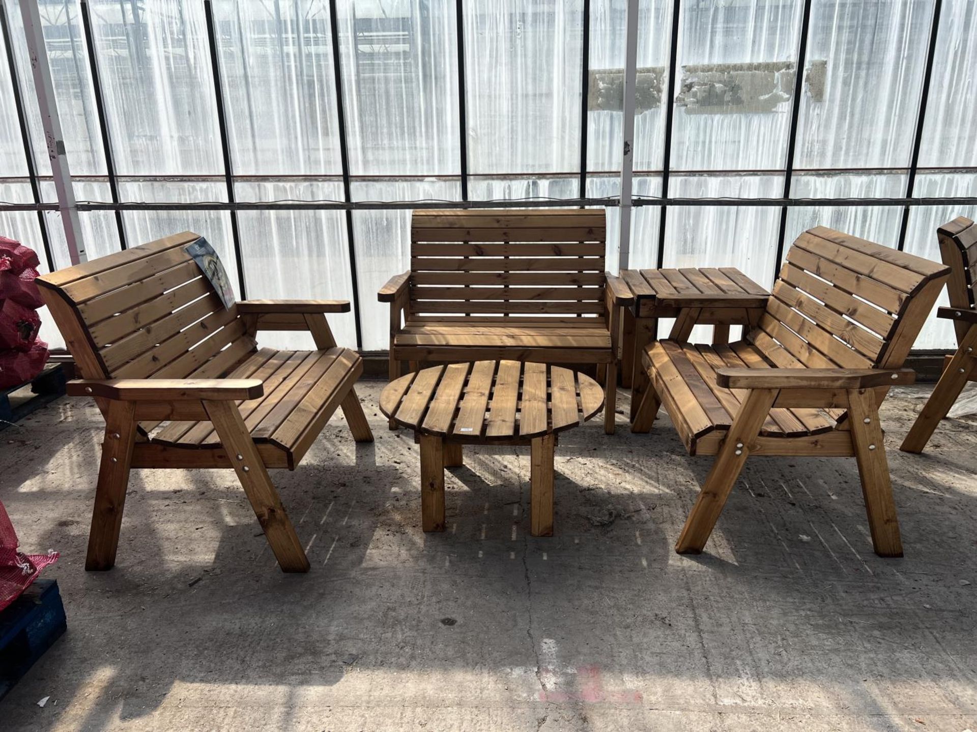 AN AS NEW EX DISPLAY CHARLES TAYLOR PATIO SET COMPRISING THREE 2 SEAT BENCHES TWO TABLES ONE ROUND &