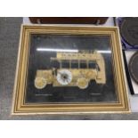 AN IMAGE OF A 1915 LONDON OMNIBUS MADE OUT OF WATCH PARTS