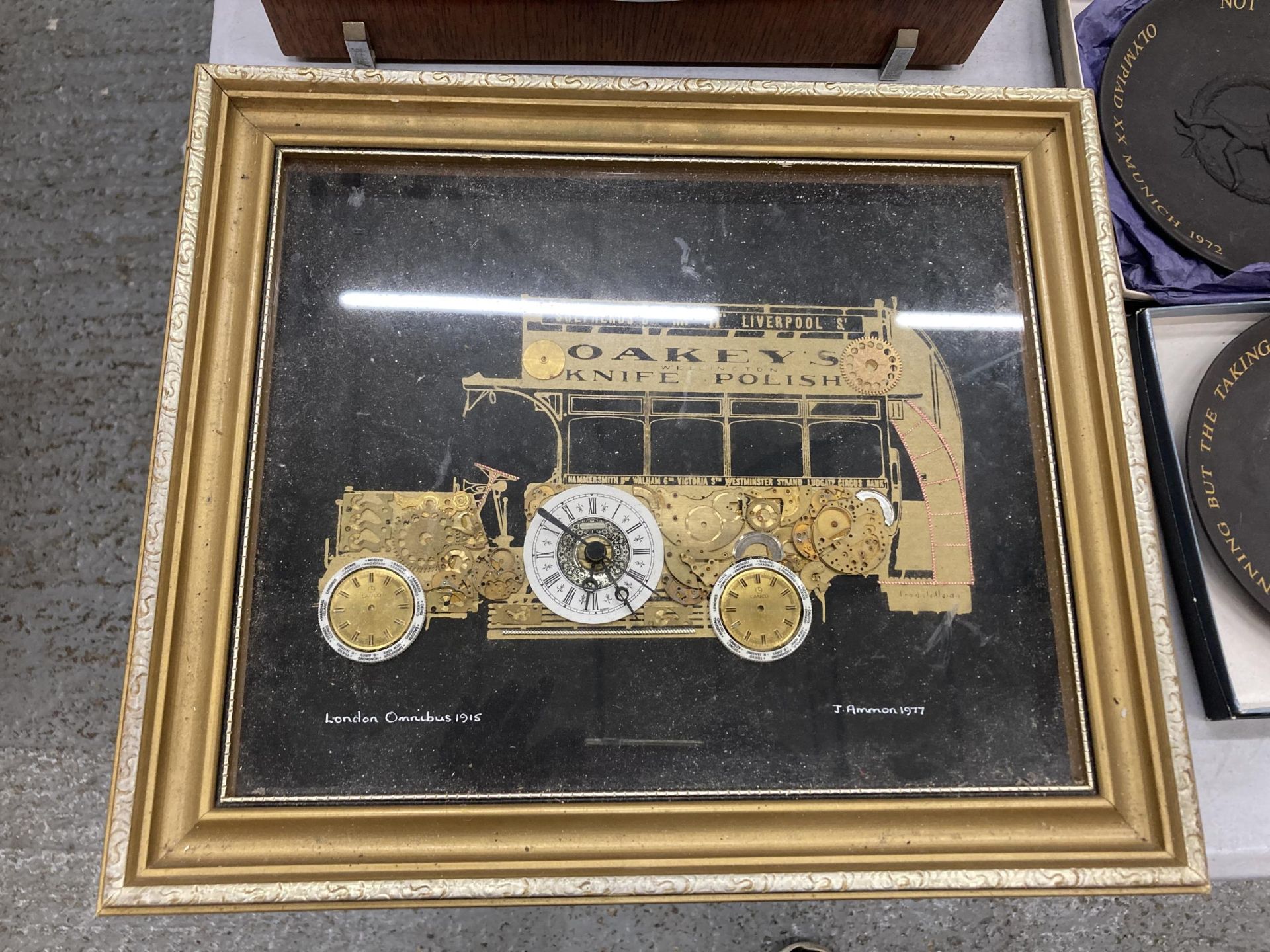 AN IMAGE OF A 1915 LONDON OMNIBUS MADE OUT OF WATCH PARTS