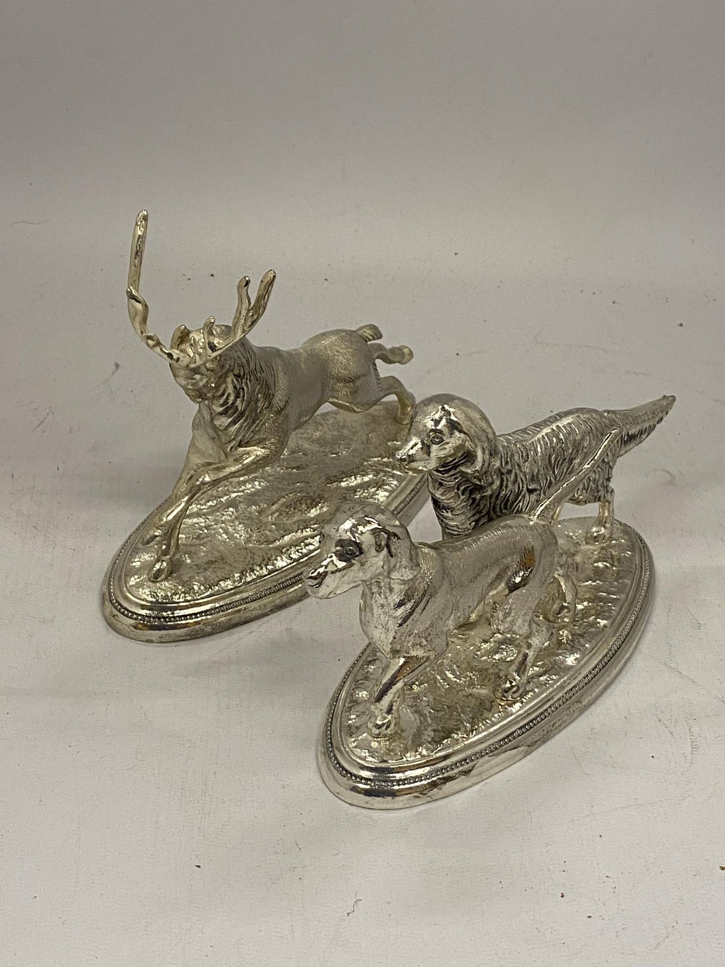 TWO WHITE METAL ORNAMENTS OF A STAG AND TWO HUNTING DOGS - Image 2 of 3