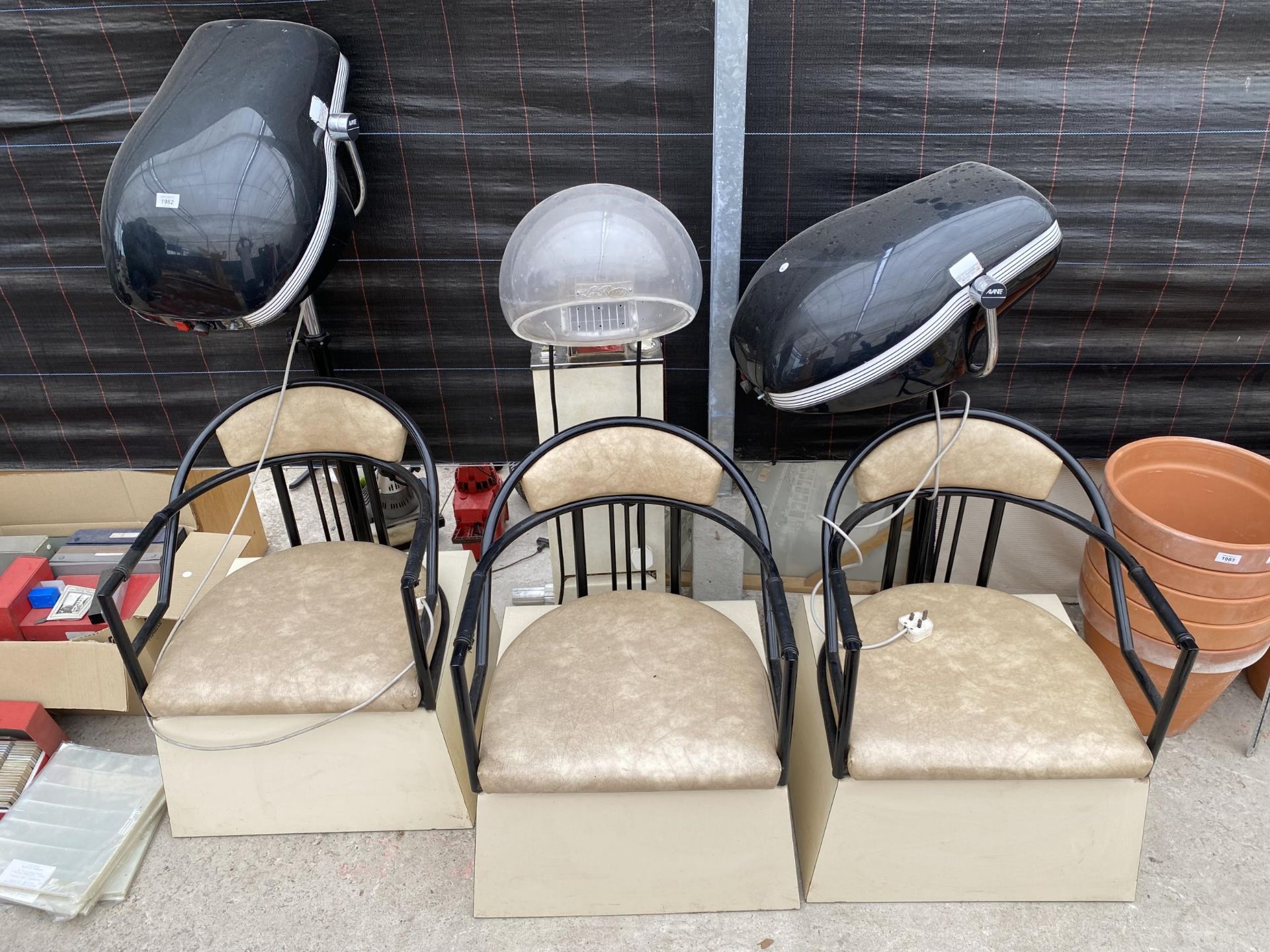 TWO HAIRDRESSERS HAIRDRYER CHAIRS AND A FURTHER HAIR DRESSING CHAIR