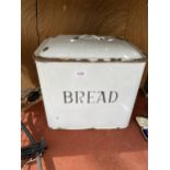 A BLUE AND WHITE ENAMEL BREAD BIN