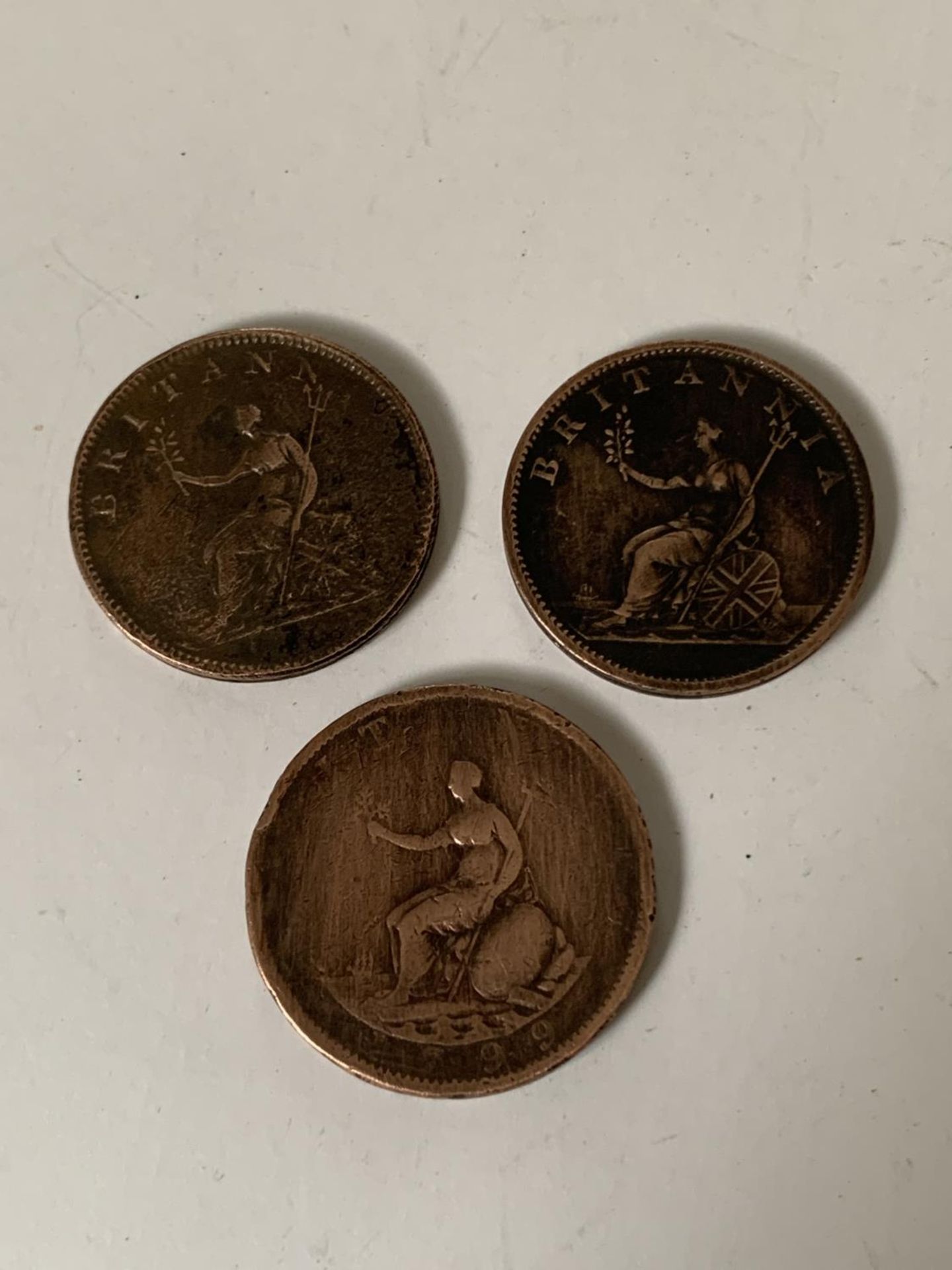 THREE GEORGE III HALFPENNY COINS - 1799, 1806 AND 1807