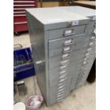 A MINIATURE 15 DRAWER FILING CABINET