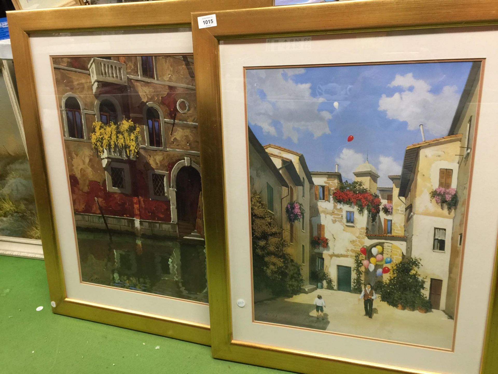 TWO LARGE PRINTS IN GILT FRAMES 80CM X 64CM