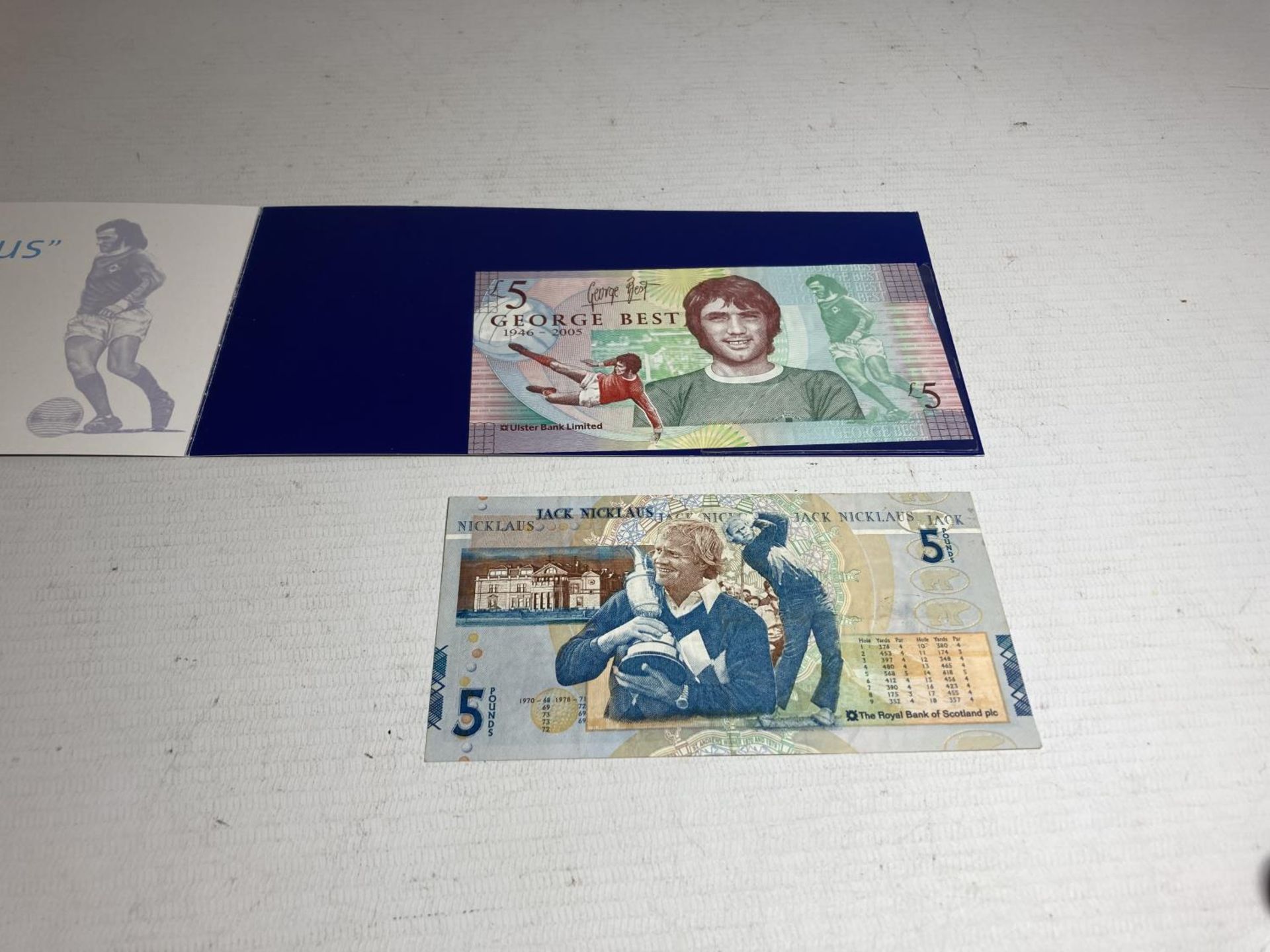 AN ULSTER BANK GEORGE BEST FIVE POUND NOTE IN A FOLDER AND A BANK OF SCOTLAND JACK NICKLAUS FIVE