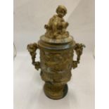 A 19TH CENTURY PEDESTAL URN WITH NEO-CLASSICAL RELIEF DESIGN ON FLUTED BASE WITH CHERUB FIGURAL LID,