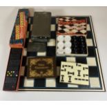 A MIXED GAMES LOT TO INCLUDE BOXED DRAUGHTMEN SET, DICE DOMINOES, ROWNTREES COCOA TIN ETC