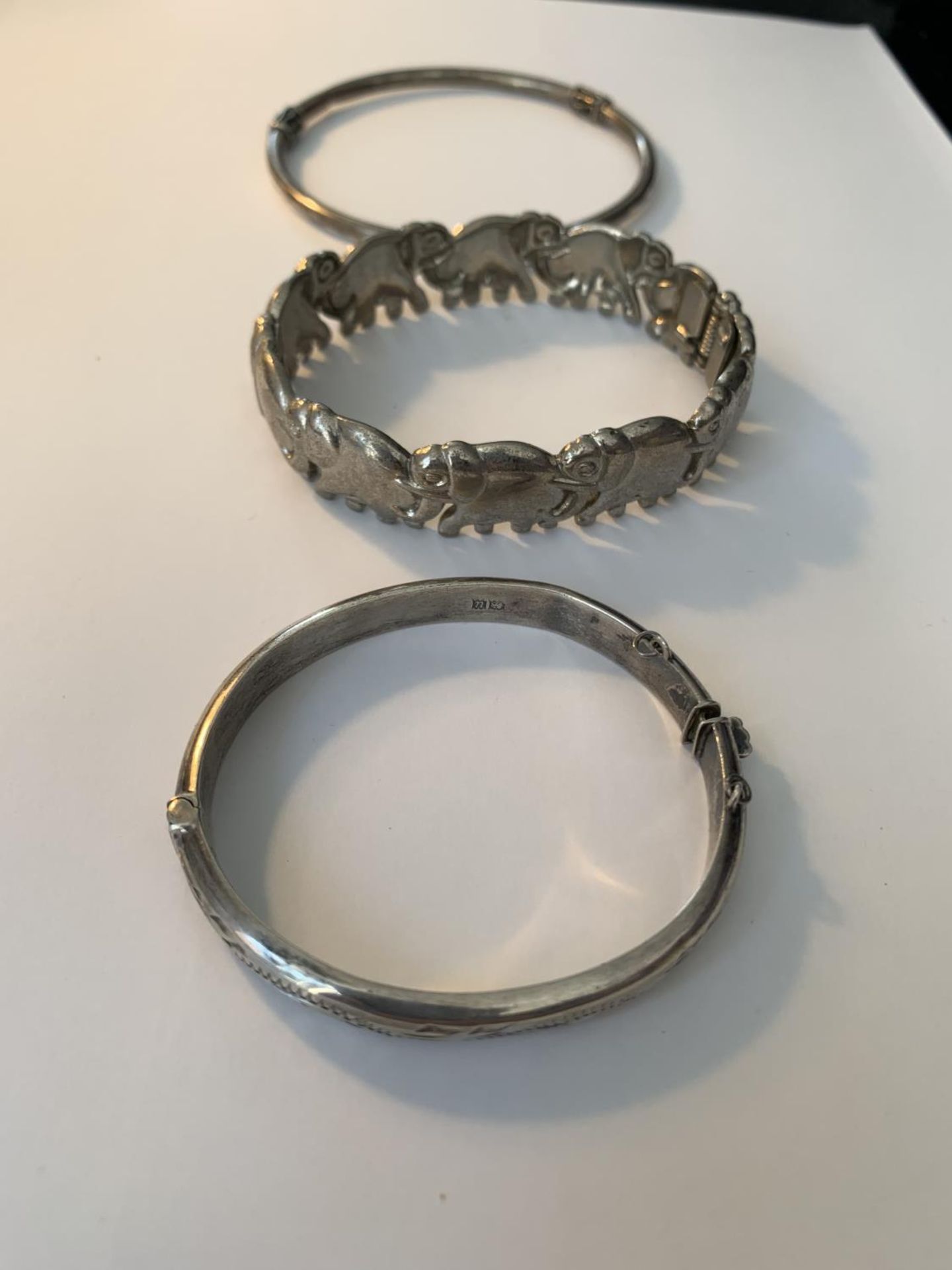 THREE SILVER BANGLES